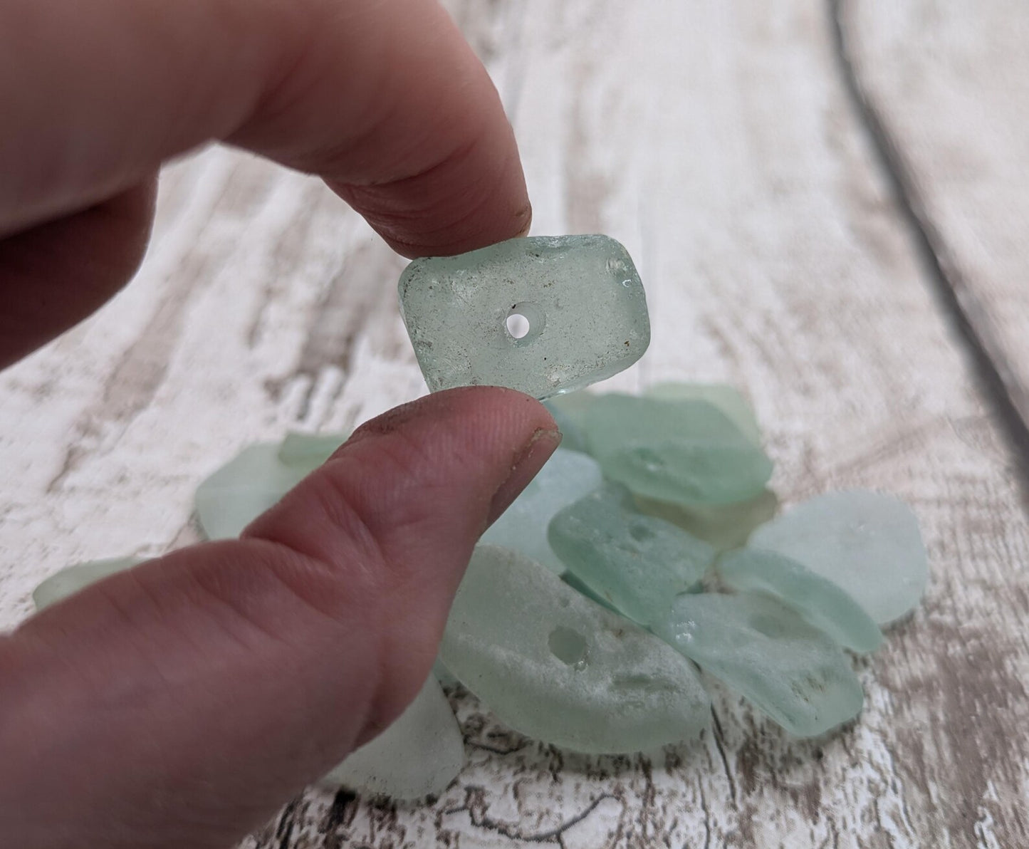 Teal sea glass central drilled beads.