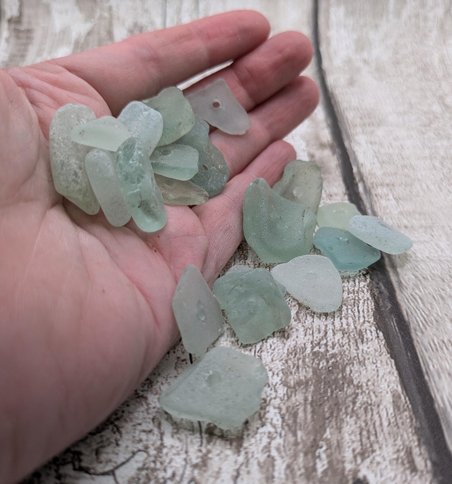 Teal sea glass central drilled beads.