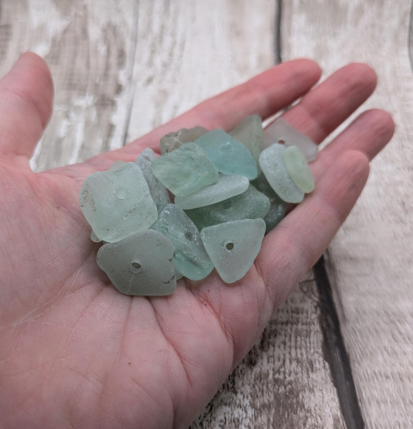 Teal sea glass central drilled beads.