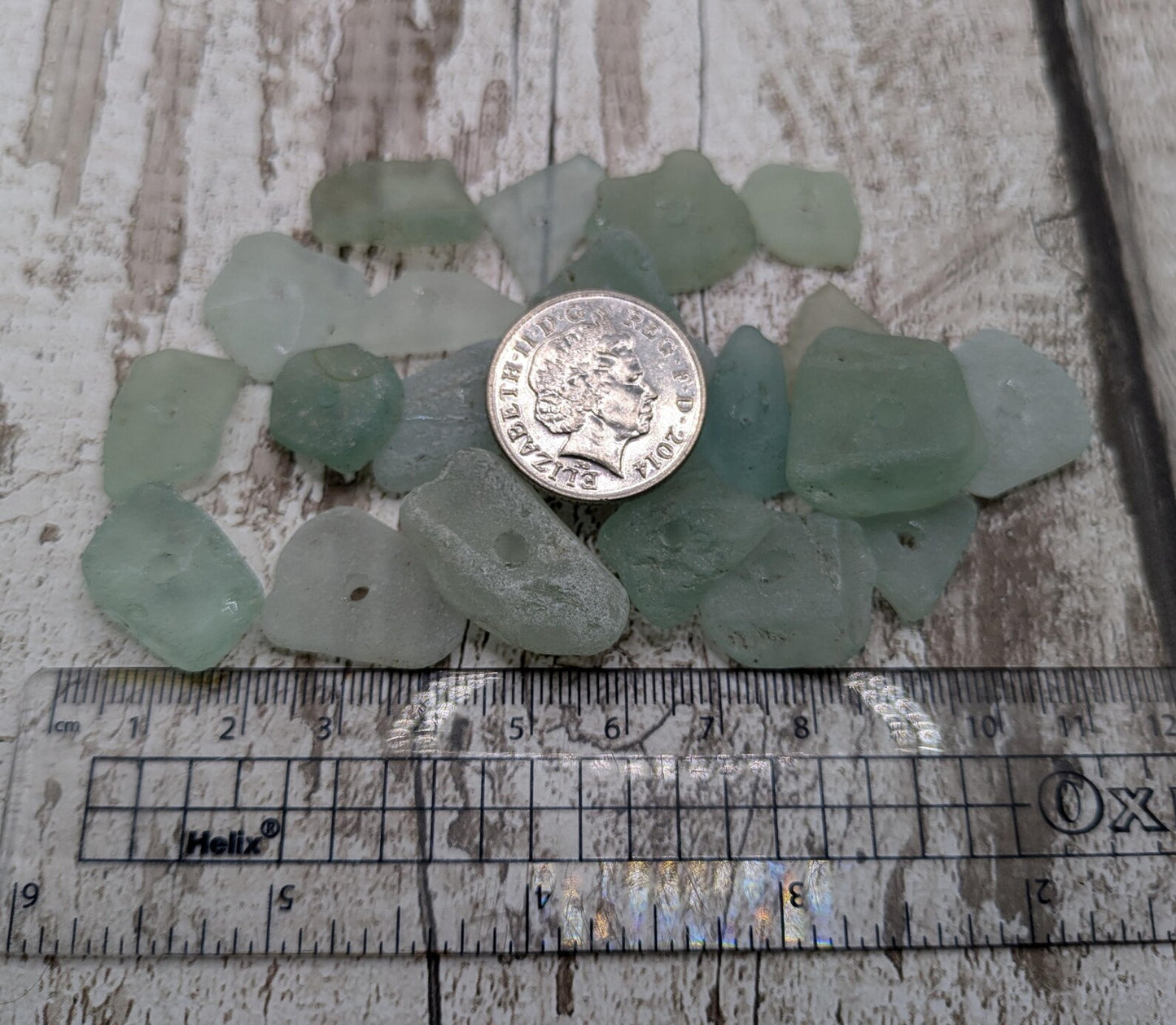 Teal sea glass central drilled beads.