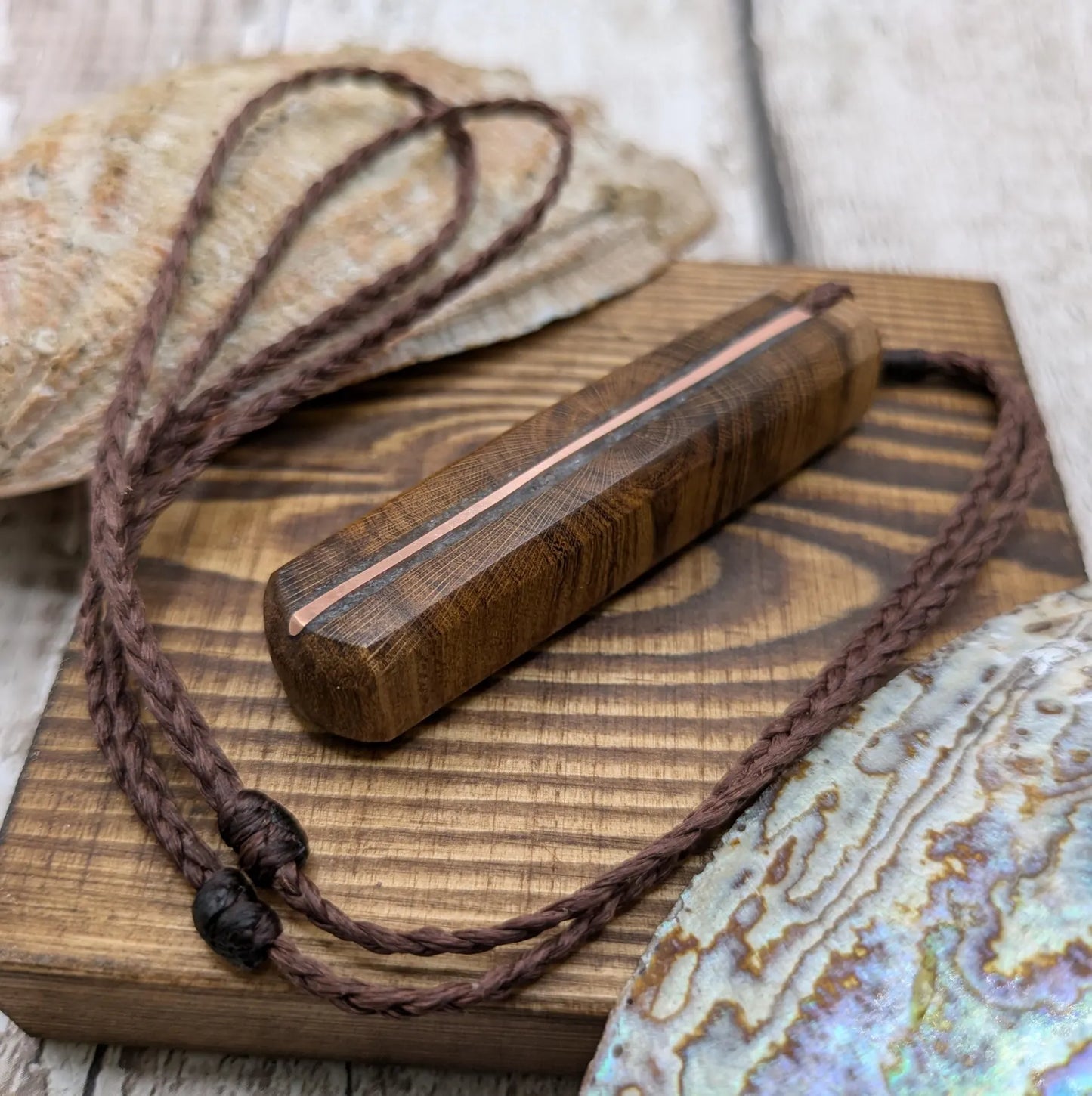 Laburnum wood with blue kyanite and copper pendant.