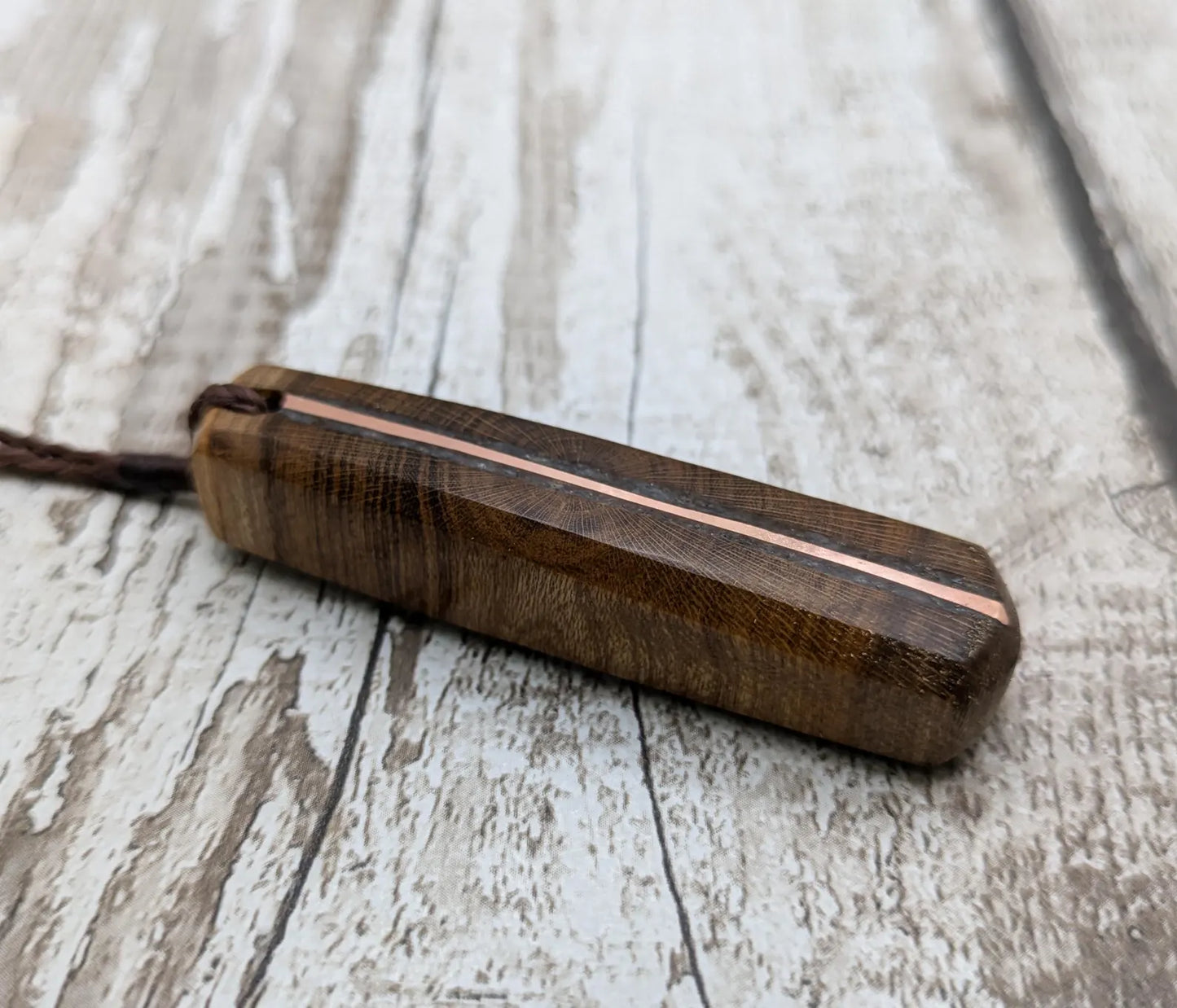 Laburnum wood with blue kyanite and copper pendant.