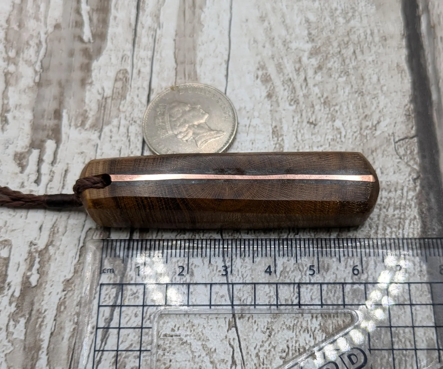 Laburnum wood with blue kyanite and copper pendant.