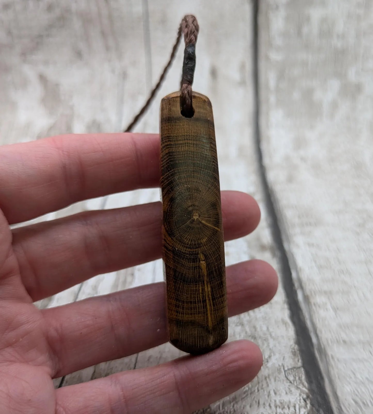 Laburnum wood with blue kyanite and copper pendant.