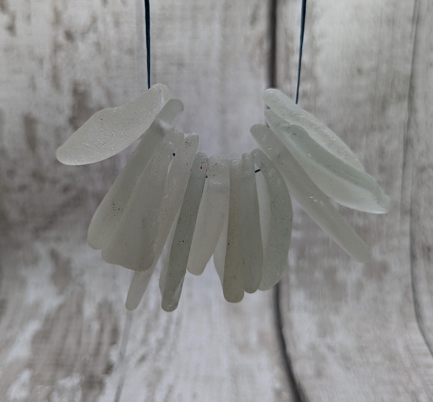 20 large White frosted sea glass beads.