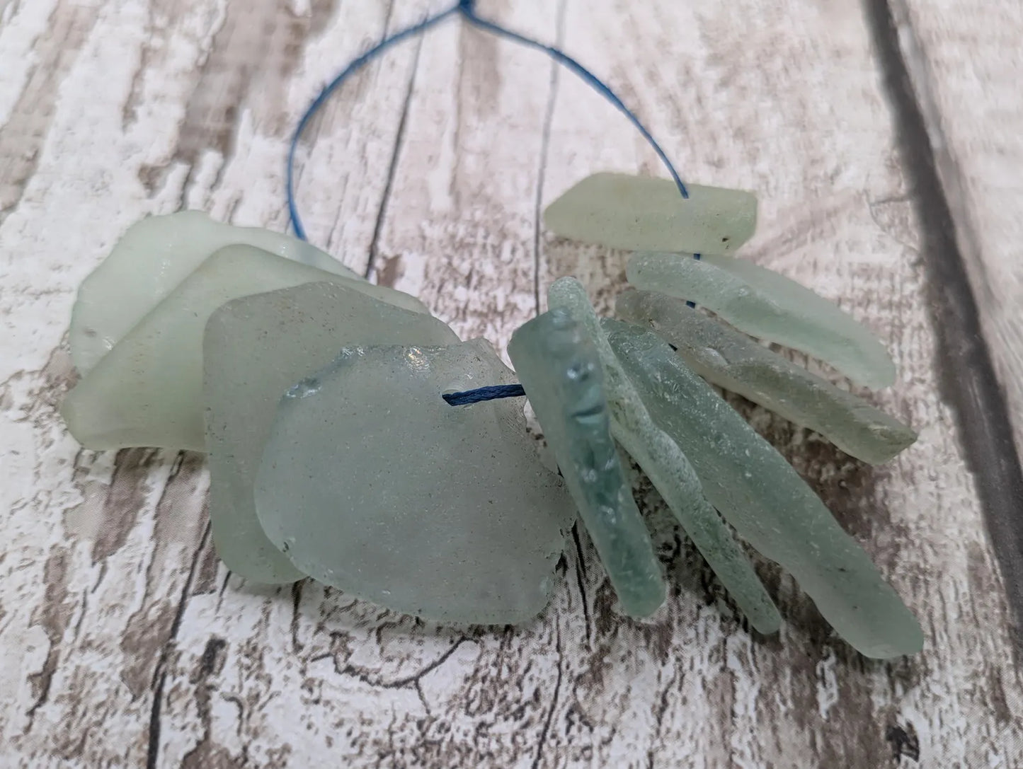 Teal sea glass frosted beads.