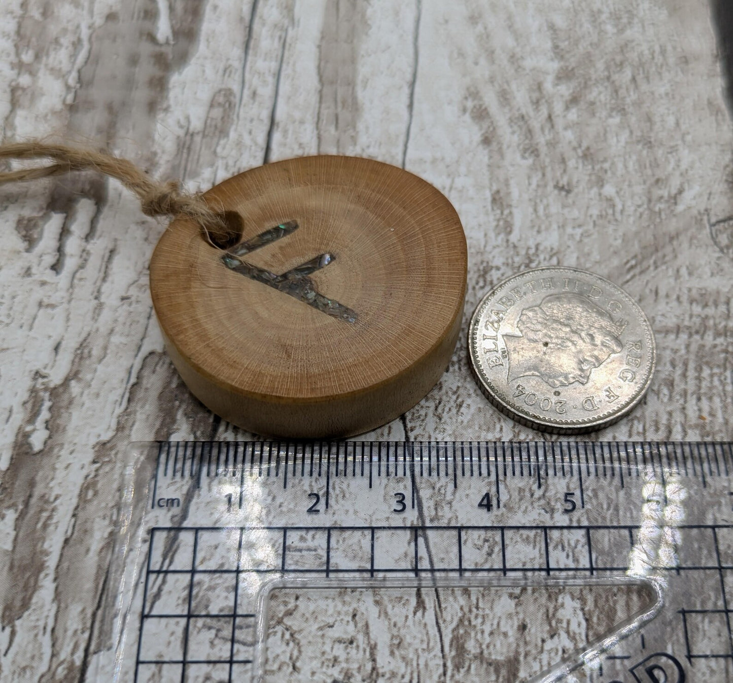 Apple wood ansuz rune Christmas decoration.
