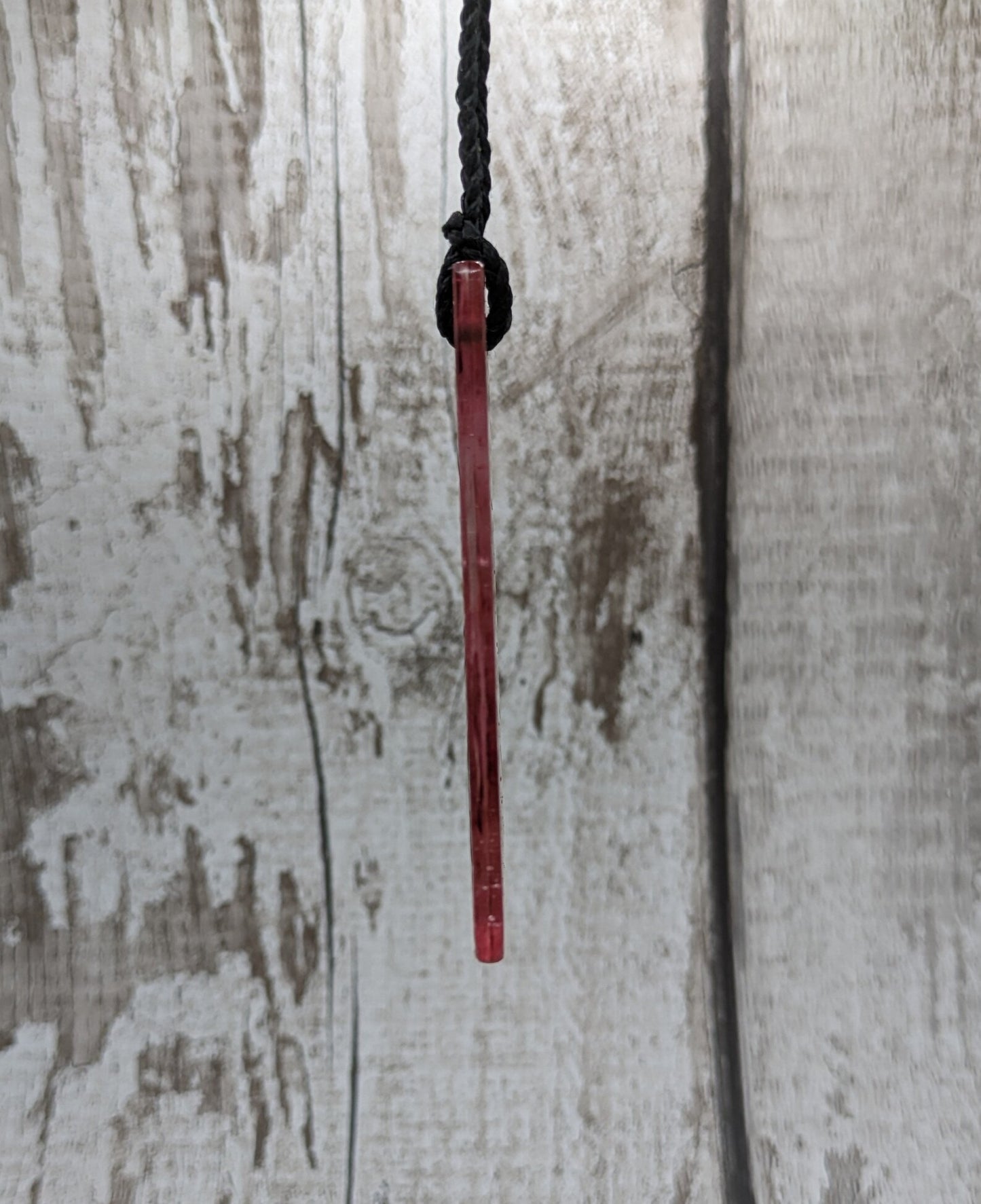 Red recycled stained glass Christmas decoration.