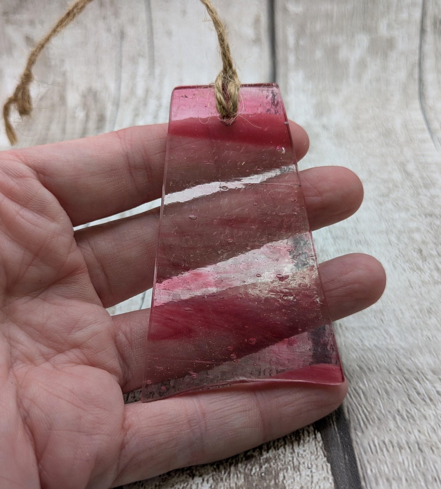 Red recycled stained glass Christmas decoration.