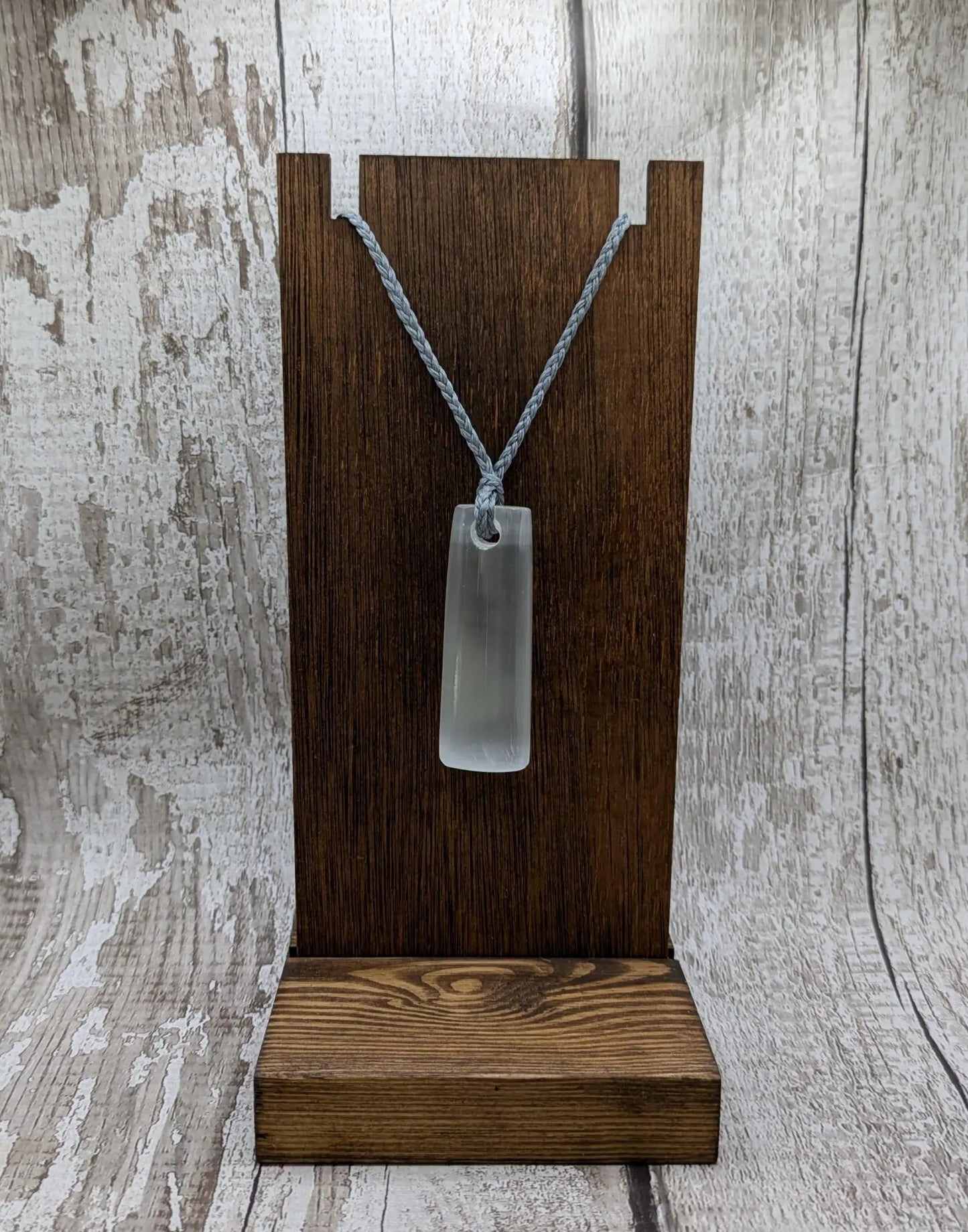 Selenite satin spa Hei Toki adze pendant.