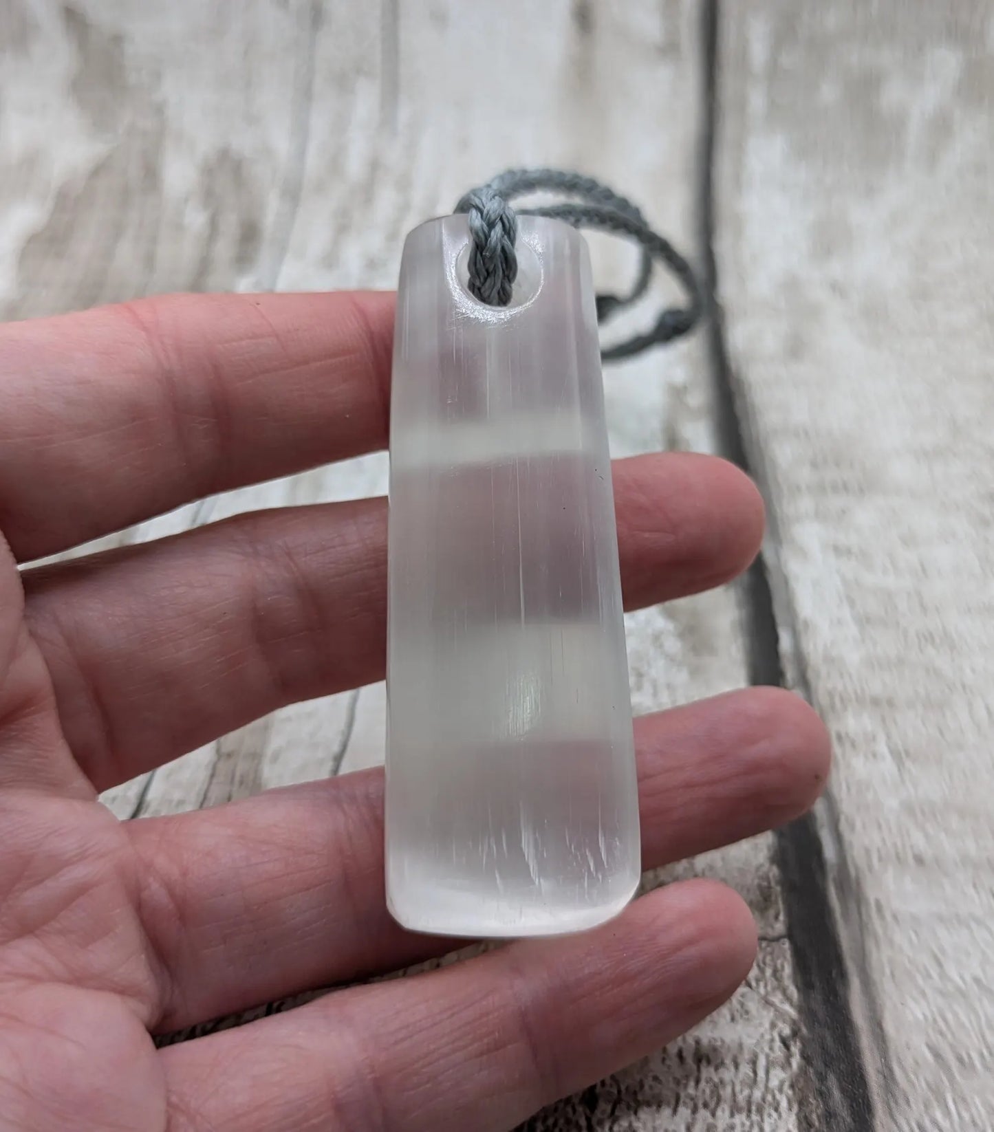Selenite satin spa Hei Toki adze pendant.