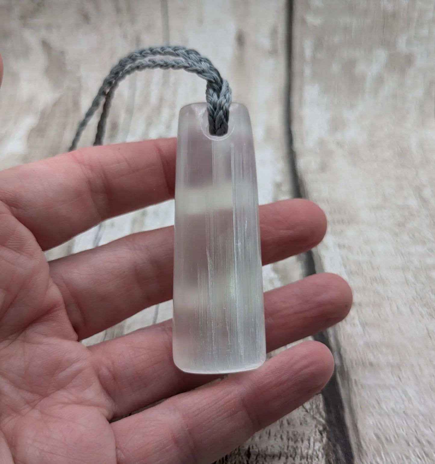 Selenite satin spa Hei Toki adze pendant.