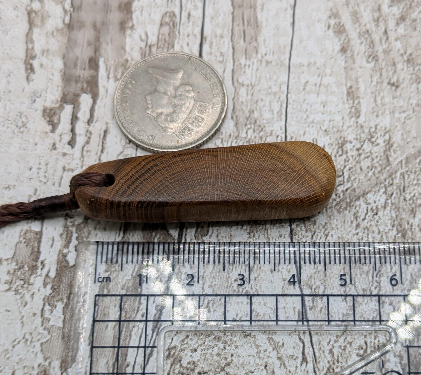 Laburnum wood roimata tear drop pendant.