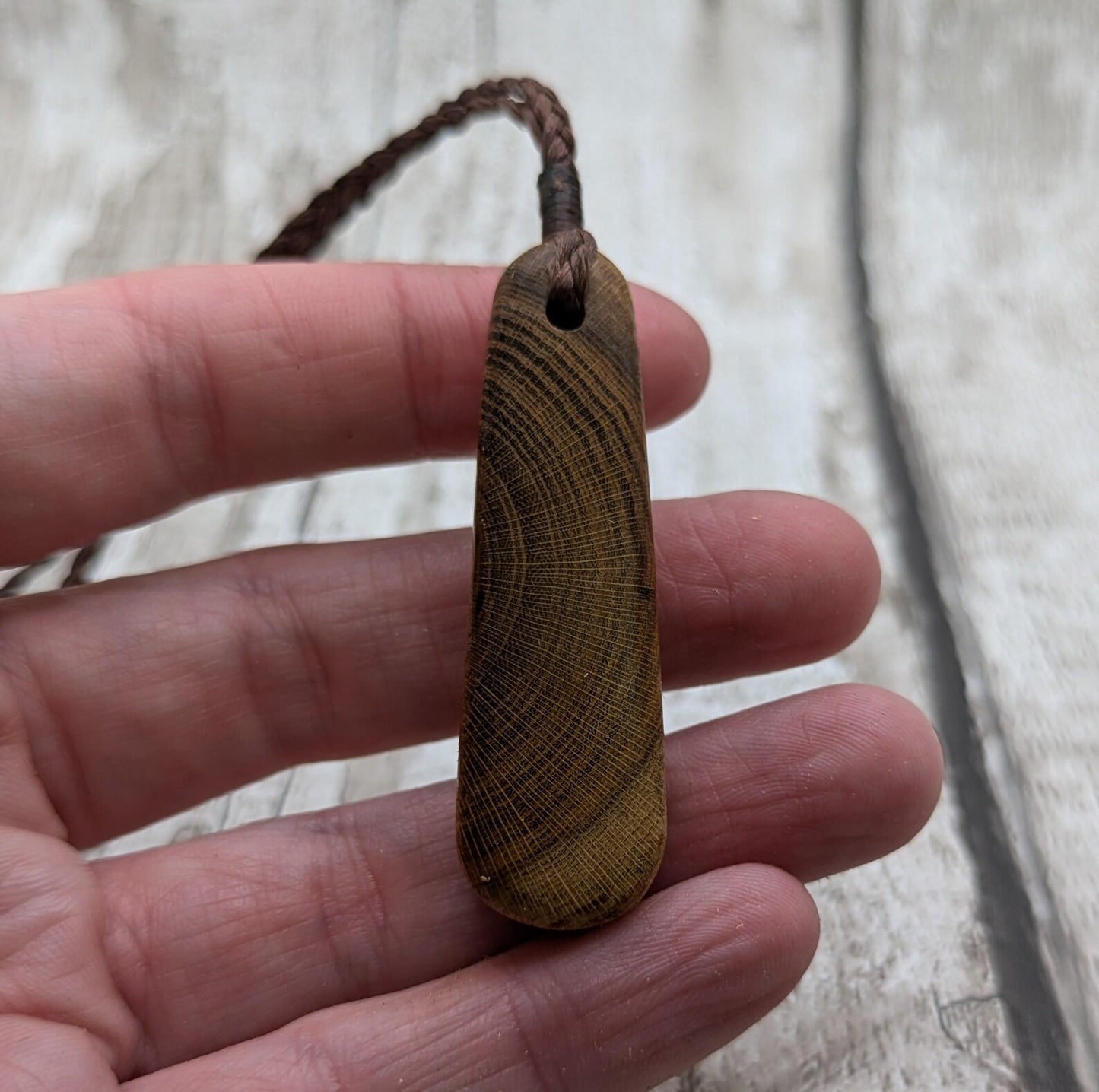Laburnum wood roimata tear drop pendant.