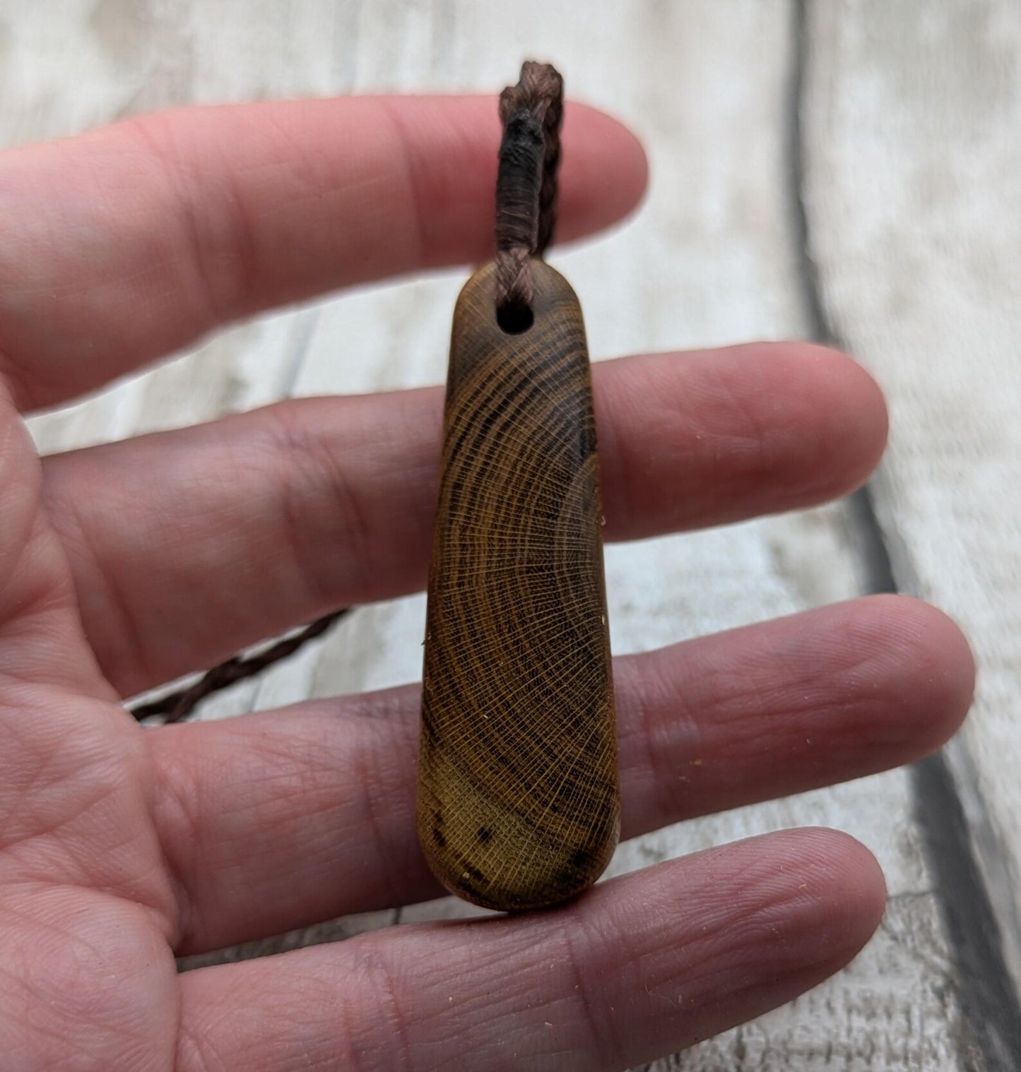 Laburnum wood roimata tear drop pendant.