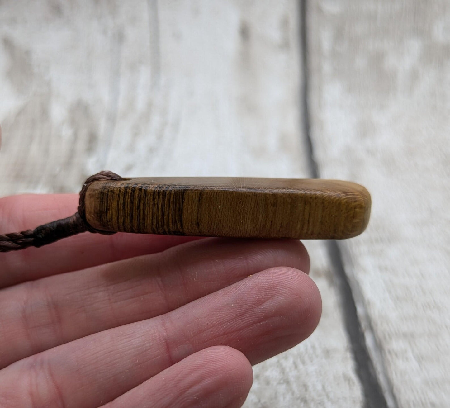 Laburnum wood roimata tear drop pendant.