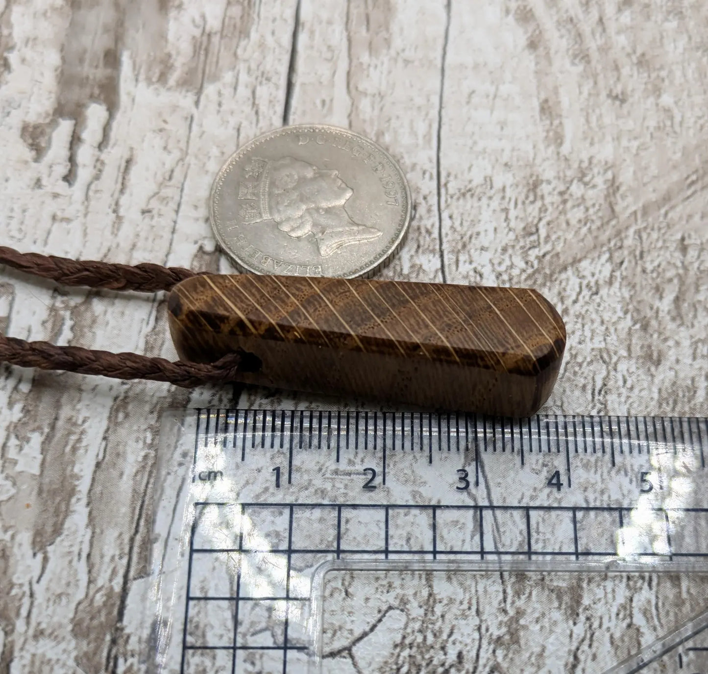 Oak wood roimata drop pendant.