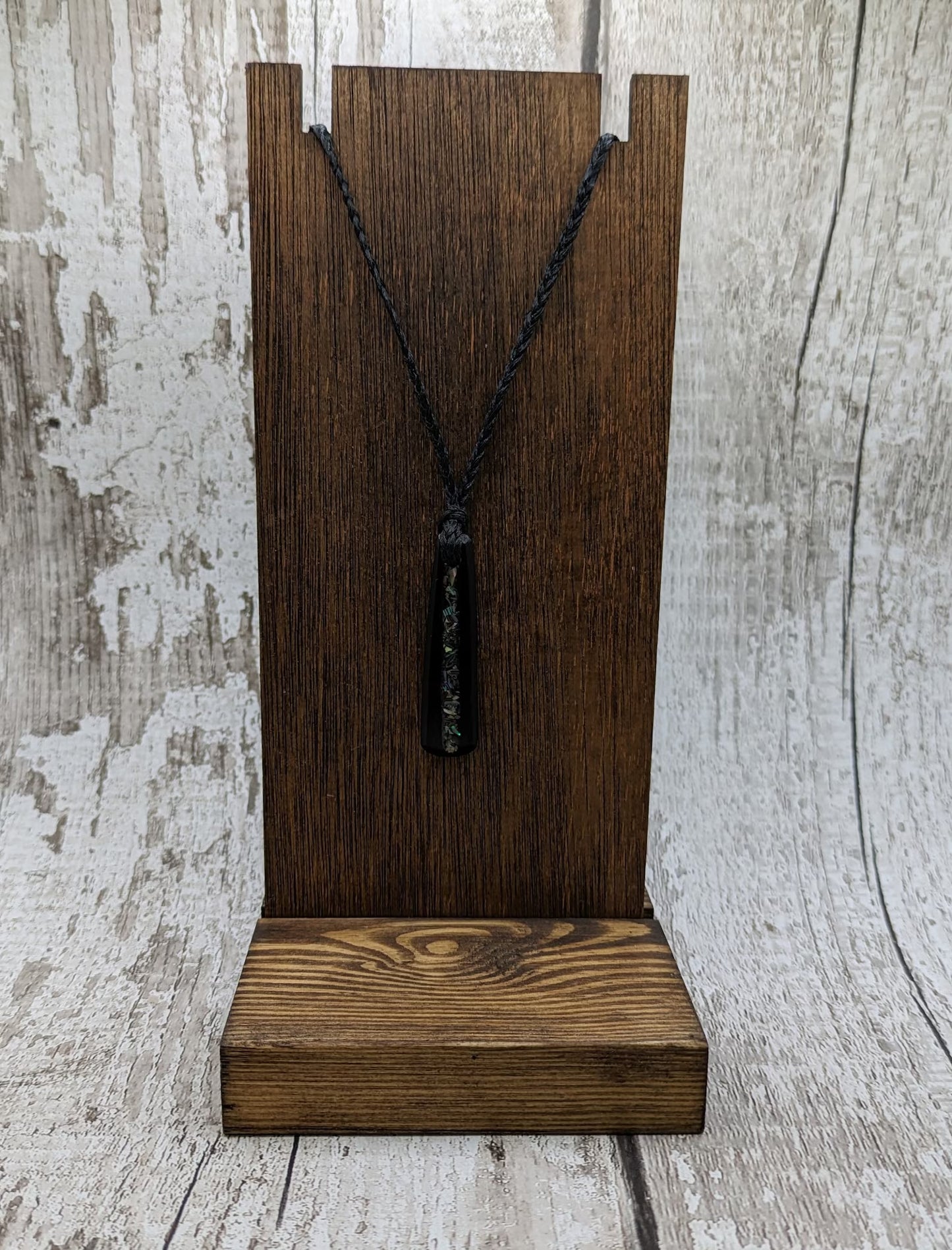 Made to order Fenland bog oak roimata drop pendant with NZ rainbow Pāua shell.