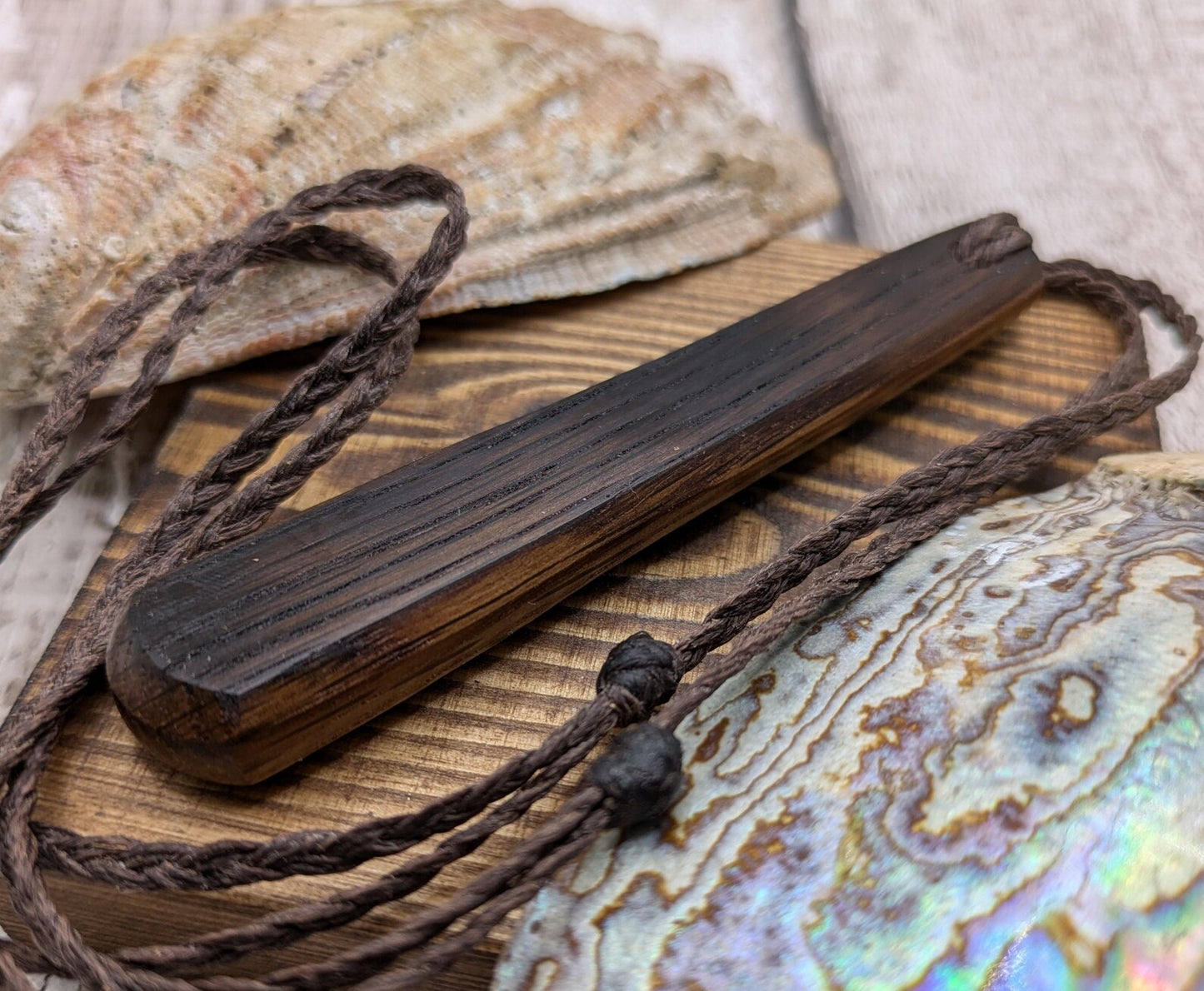 Whiskey barrel oak wood roimata teardrop pendant.