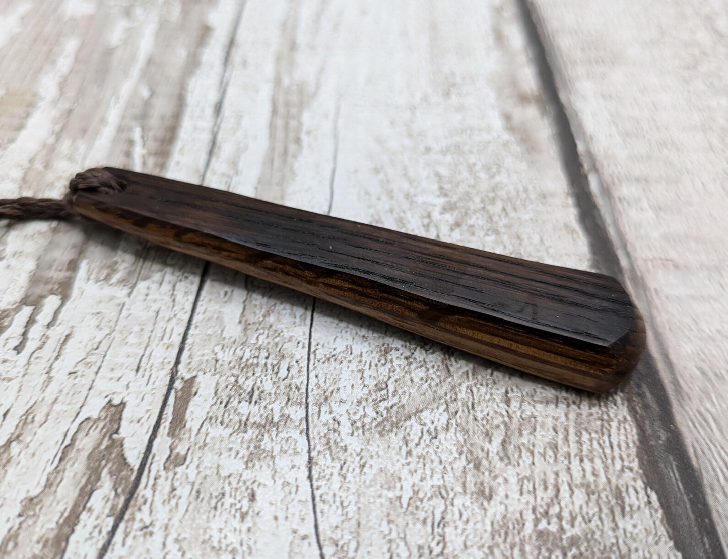 Whiskey barrel oak wood roimata teardrop pendant.