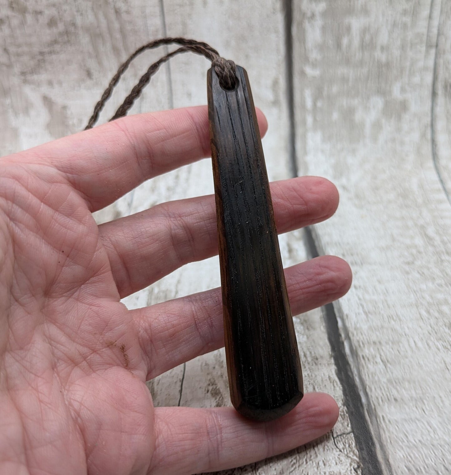 Whiskey barrel oak wood roimata teardrop pendant.