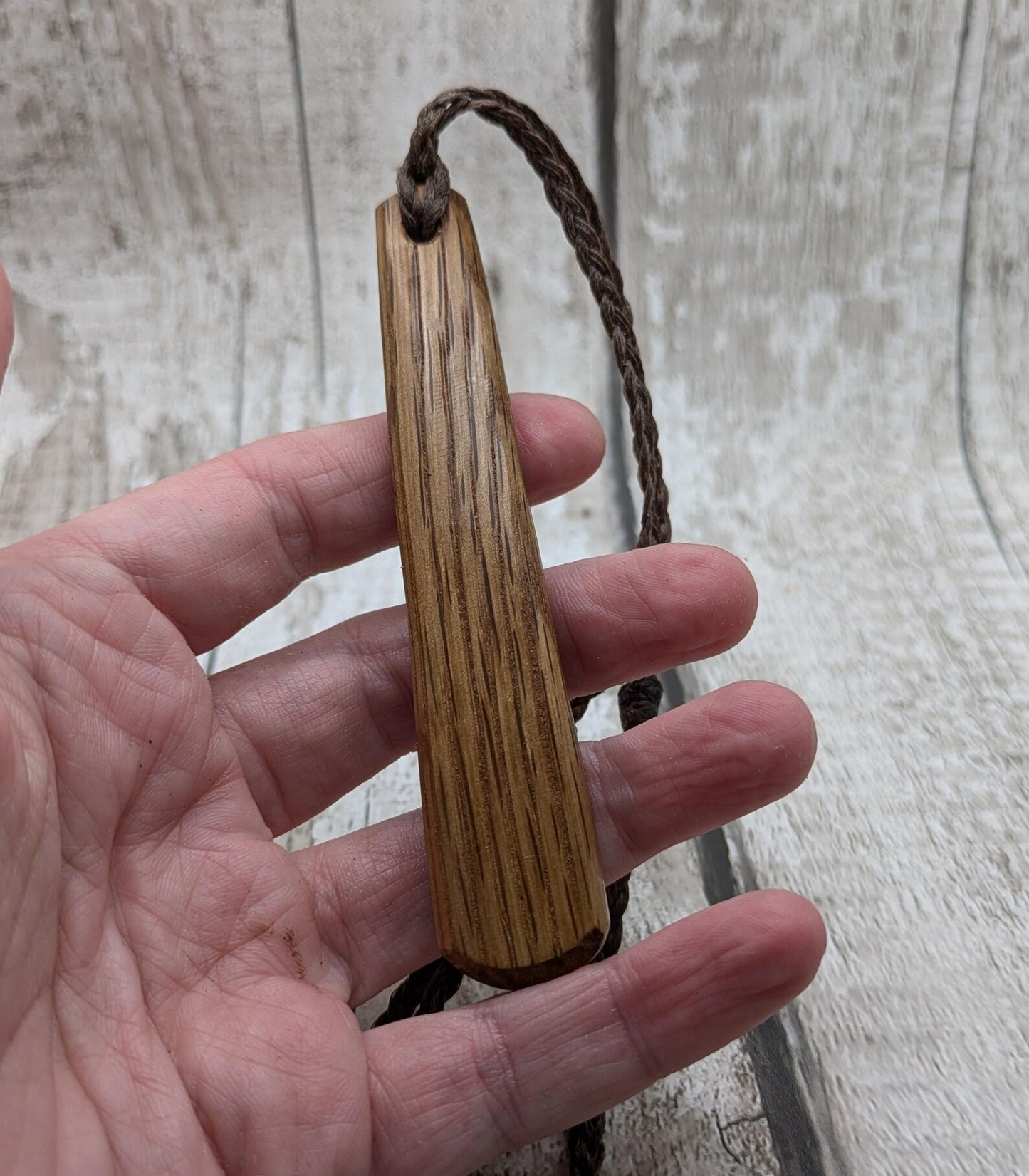 Whiskey barrel oak wood roimata teardrop pendant.