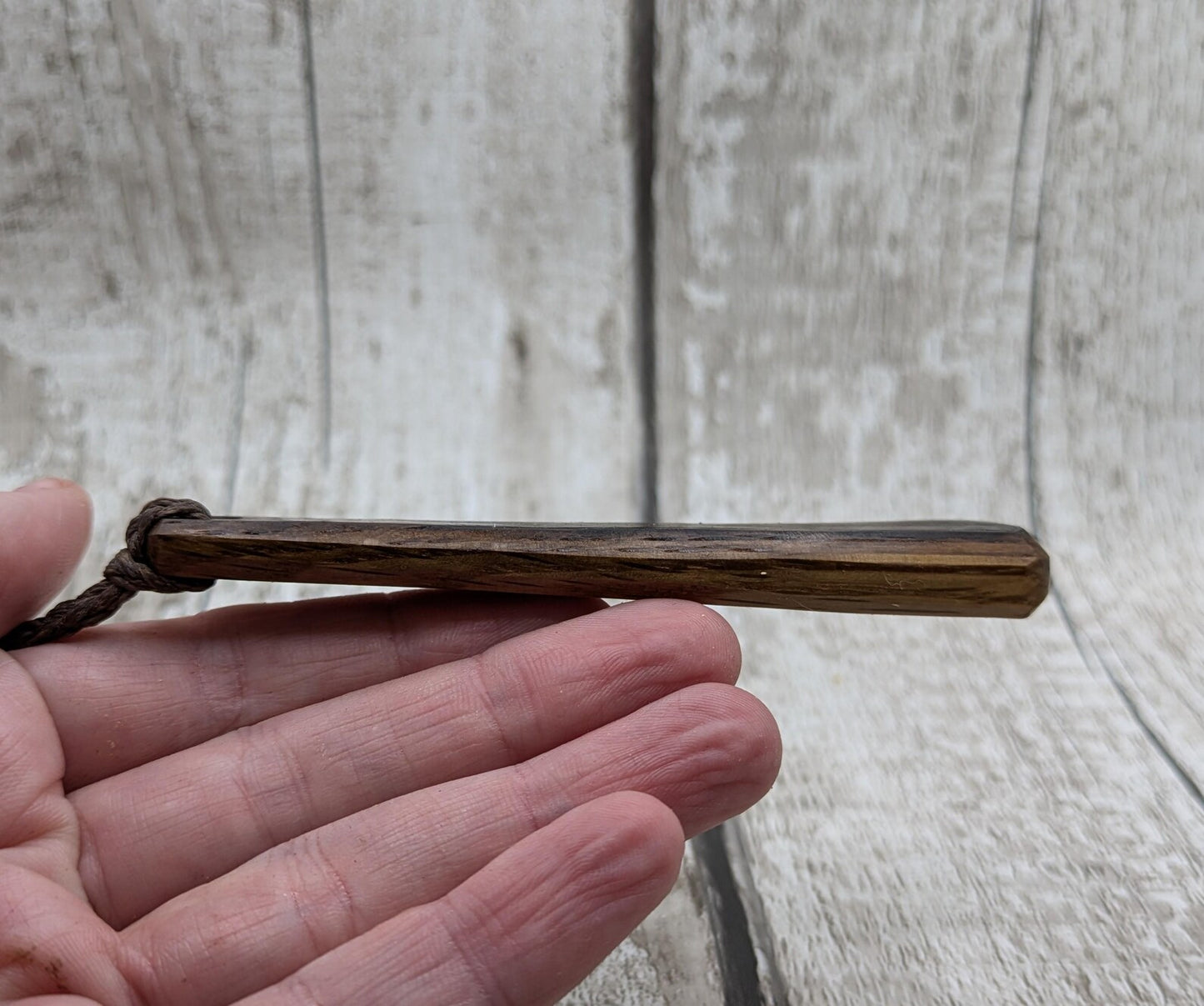 Whiskey barrel oak wood roimata teardrop pendant.