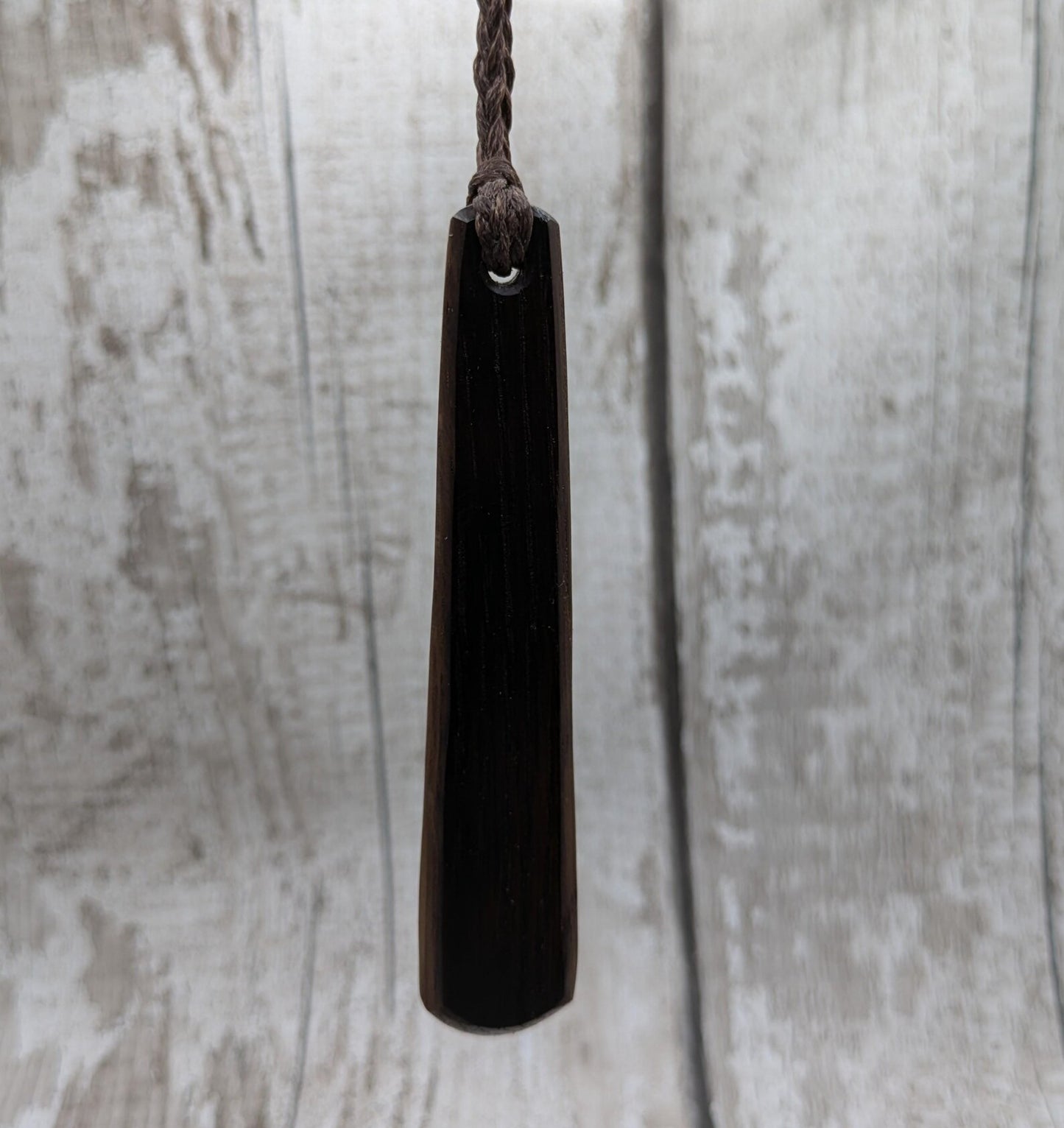 Whiskey barrel oak wood roimata teardrop pendant.