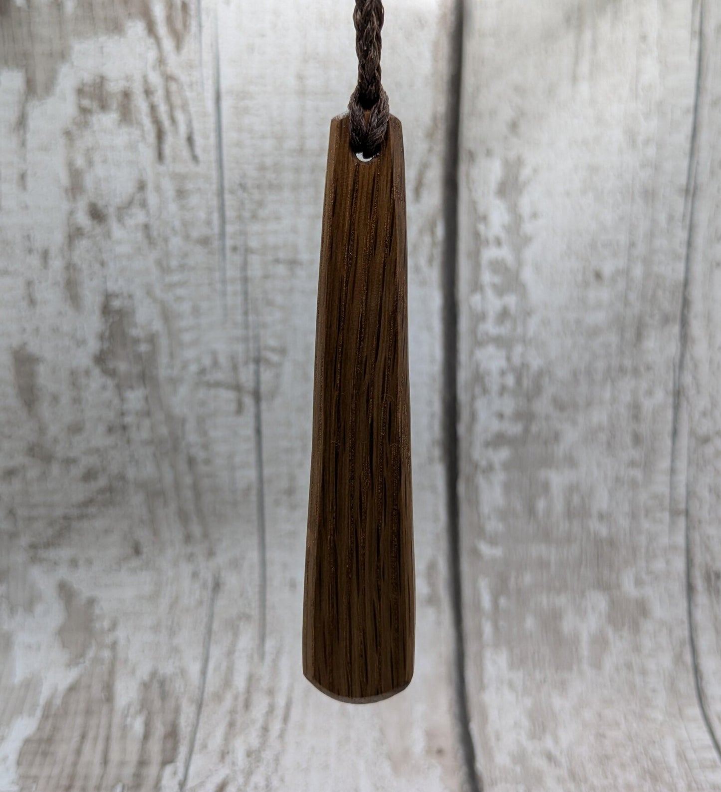 Whiskey barrel oak wood roimata teardrop pendant.