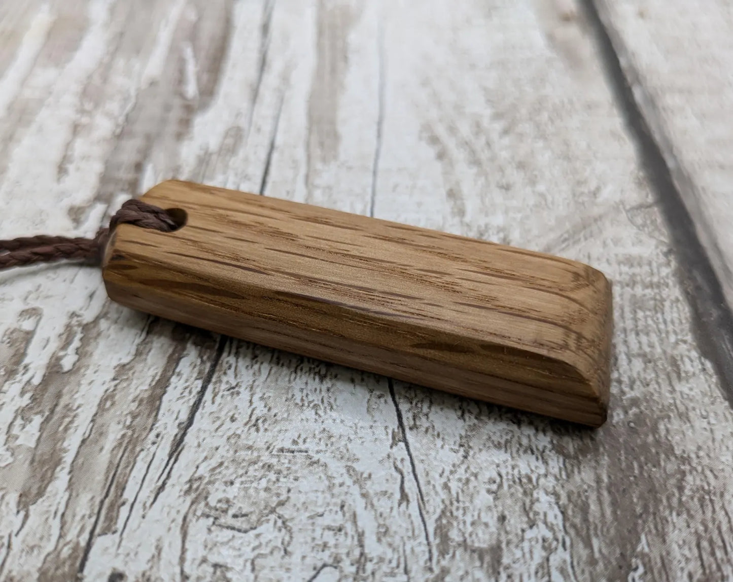 Whiskey barrel oak wood Hei Toki adze style pendant.