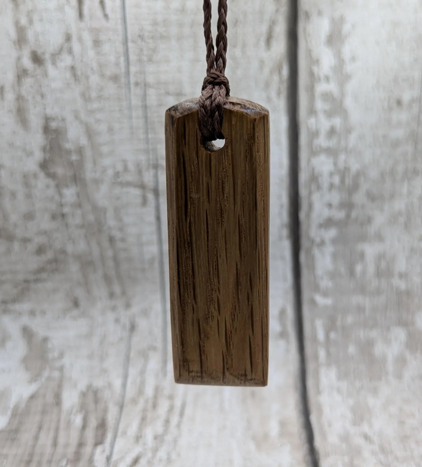 Whiskey barrel oak wood Hei Toki adze style pendant.