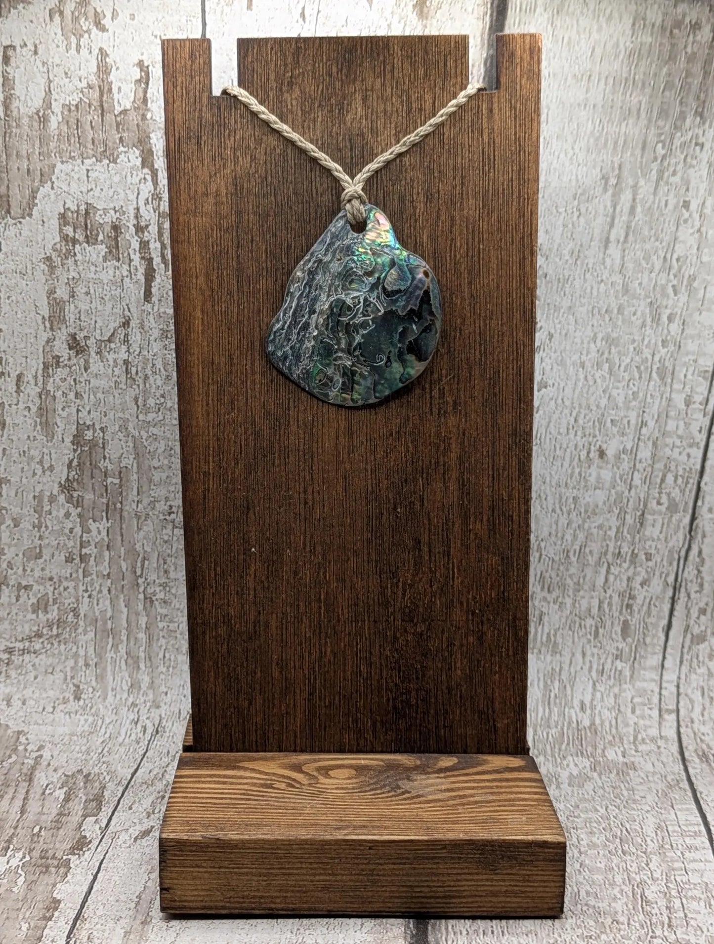 Naturally tumbled New Zealand rainbow Pāua pendant