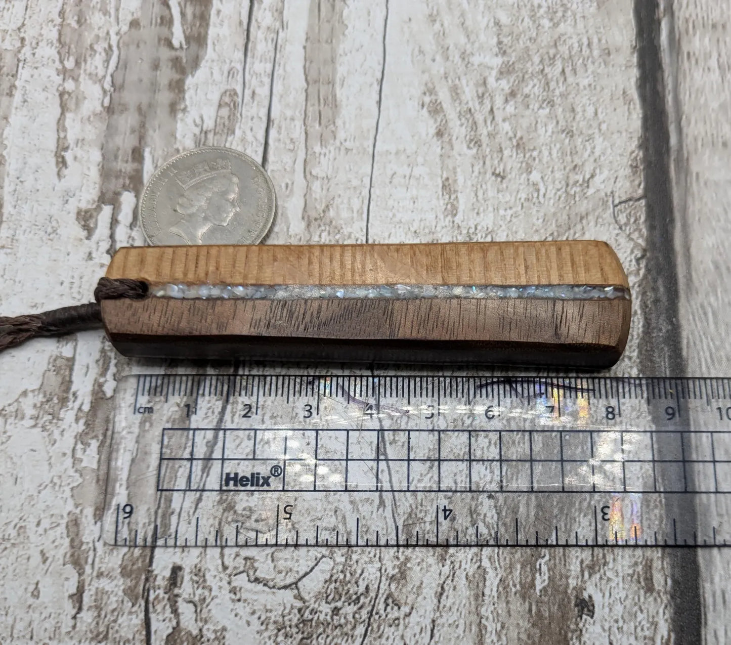 Walnut wood and whiskey barrel oak roimata pendant with freshwater Pearl.