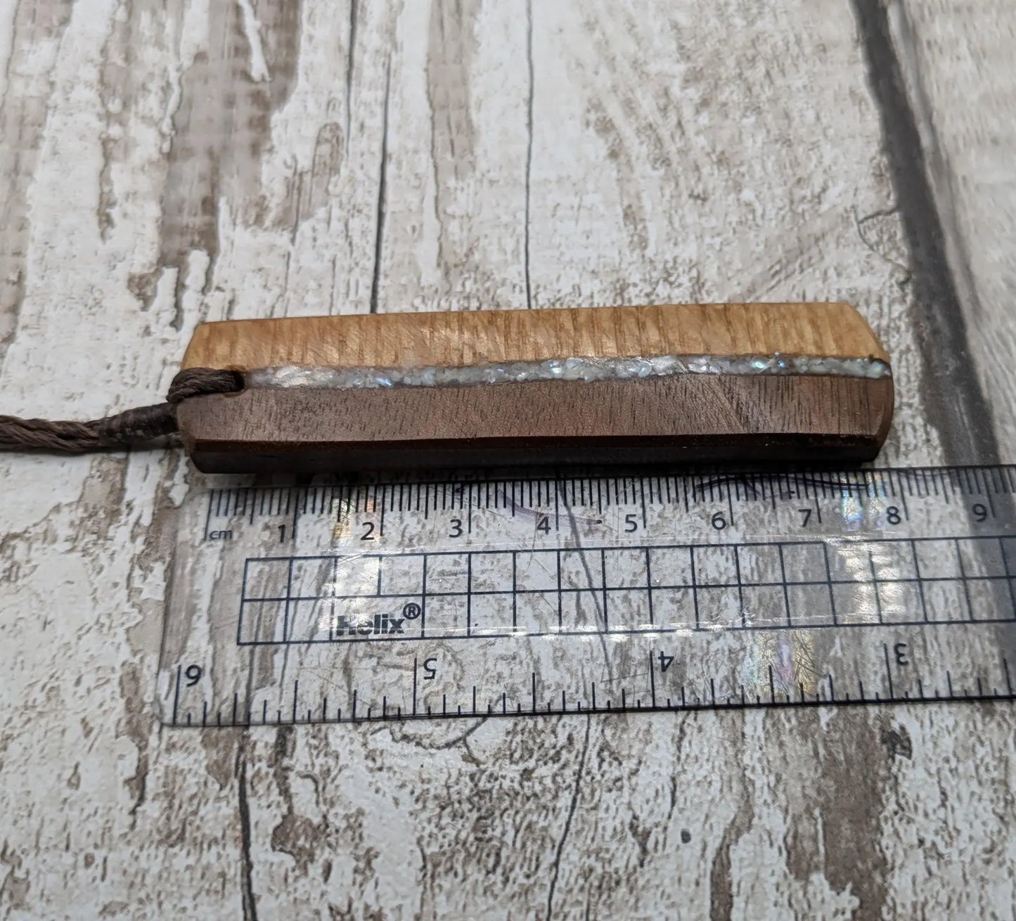 Walnut wood and whiskey barrel oak roimata pendant with freshwater Pearl.