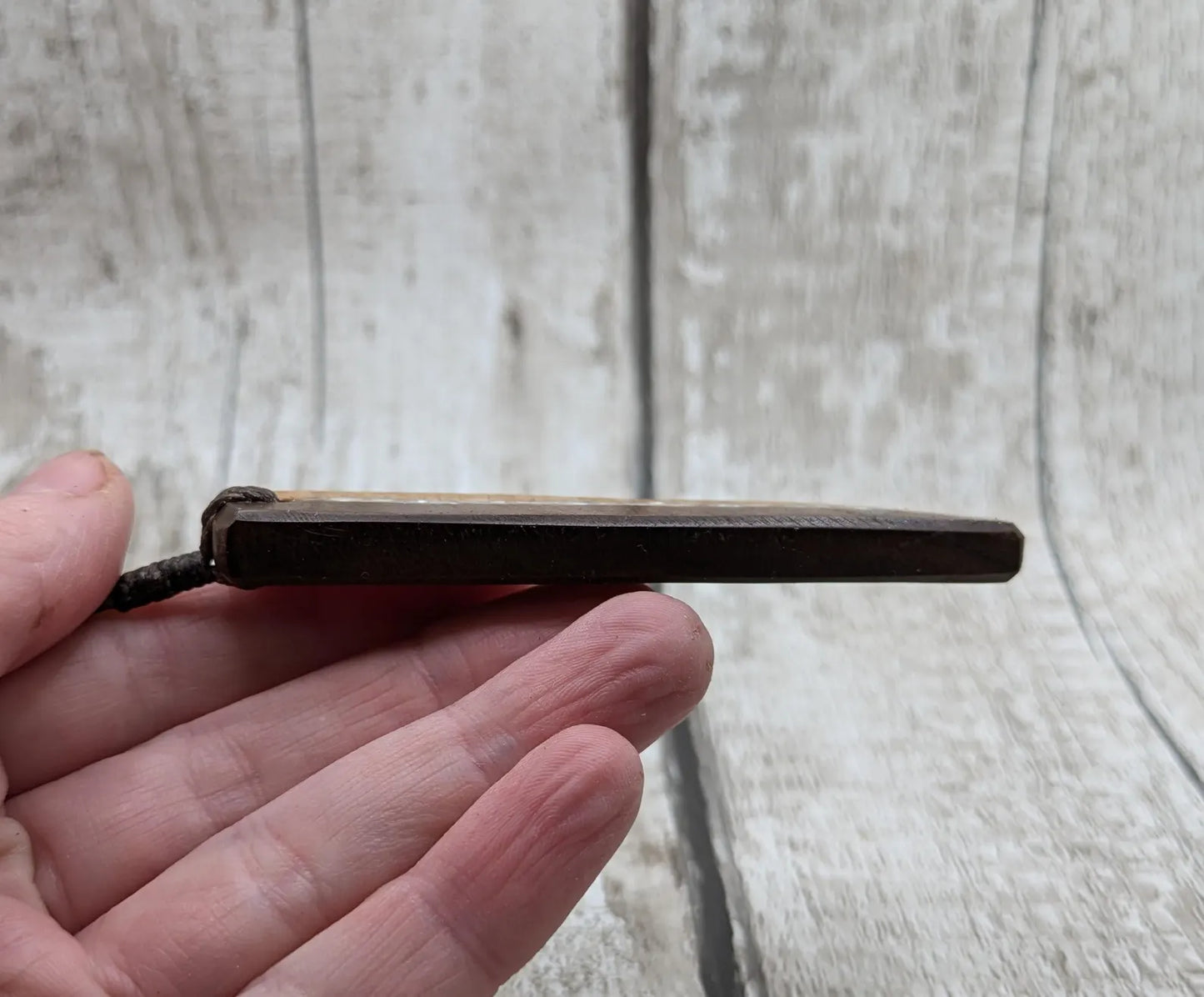 Walnut wood and whiskey barrel oak roimata pendant with freshwater Pearl.