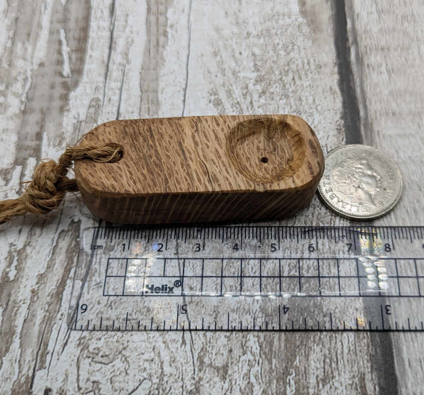 Olive wood travel sized incense holder.