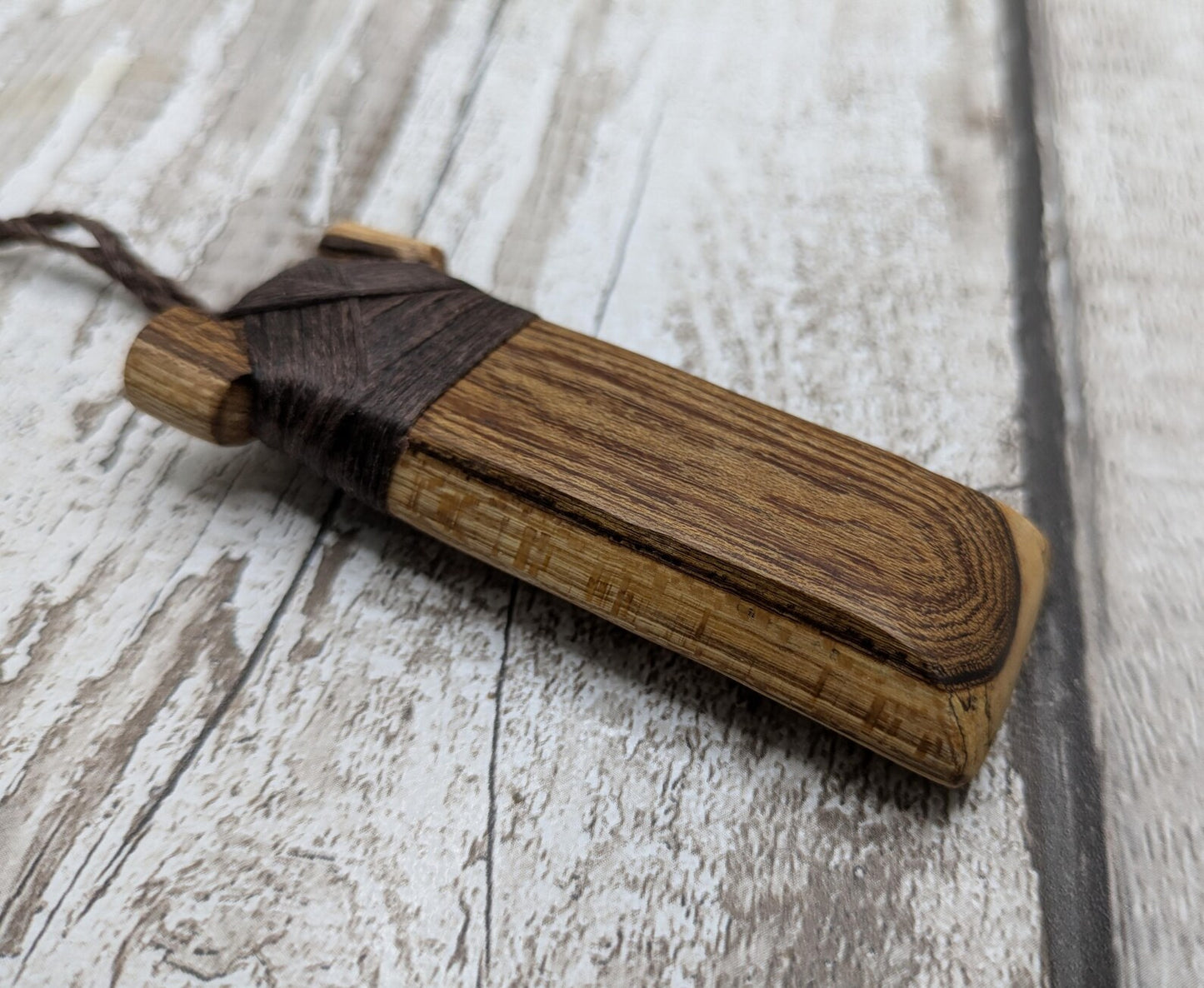 Spalted laburnum wood Hei Toki adze pendant.