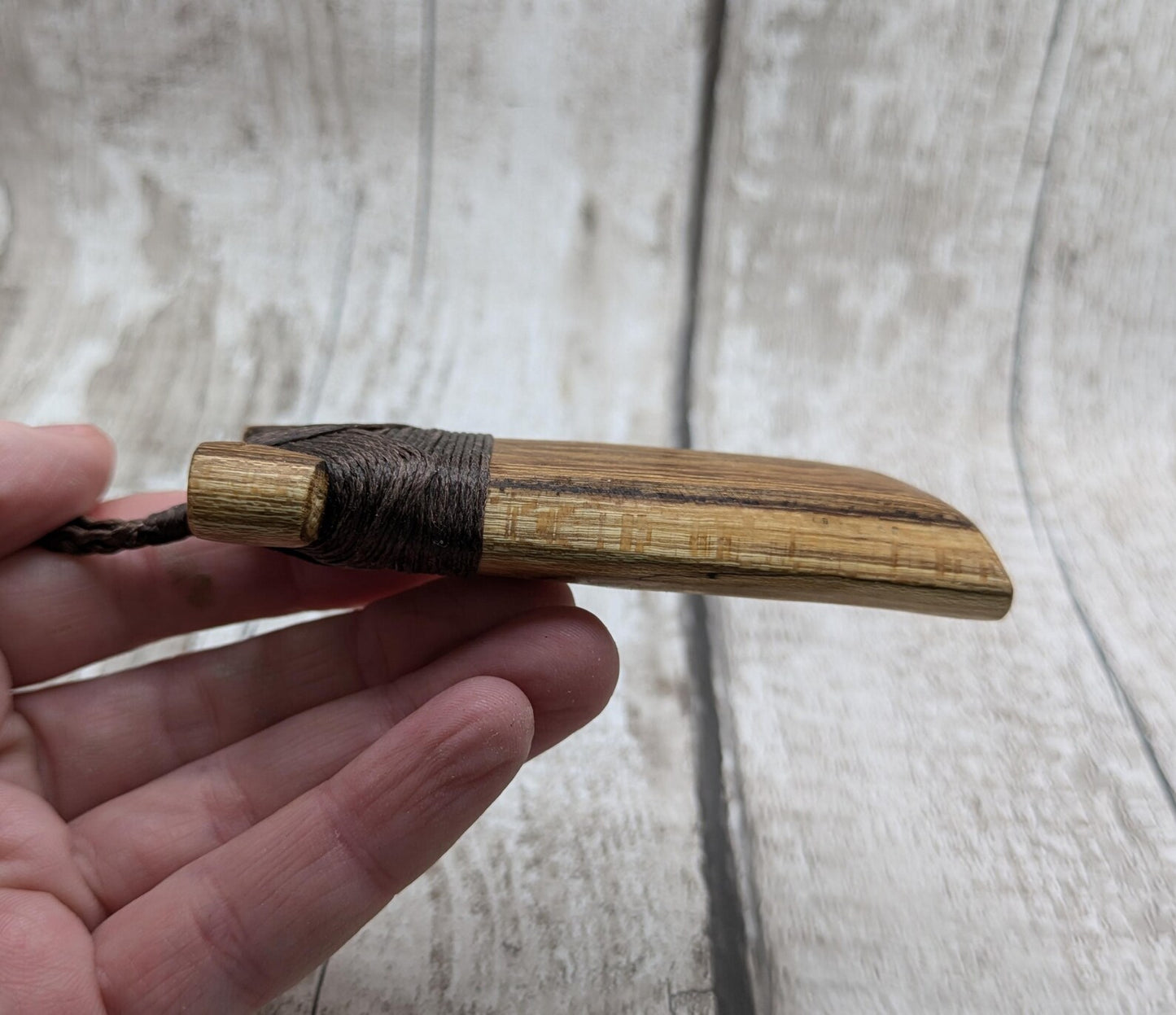 Spalted laburnum wood Hei Toki adze pendant.