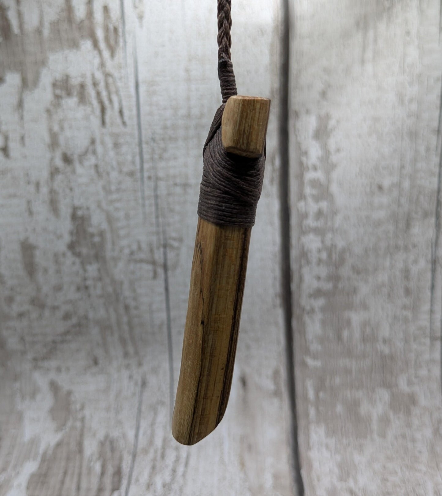 Spalted laburnum wood Hei Toki adze pendant.