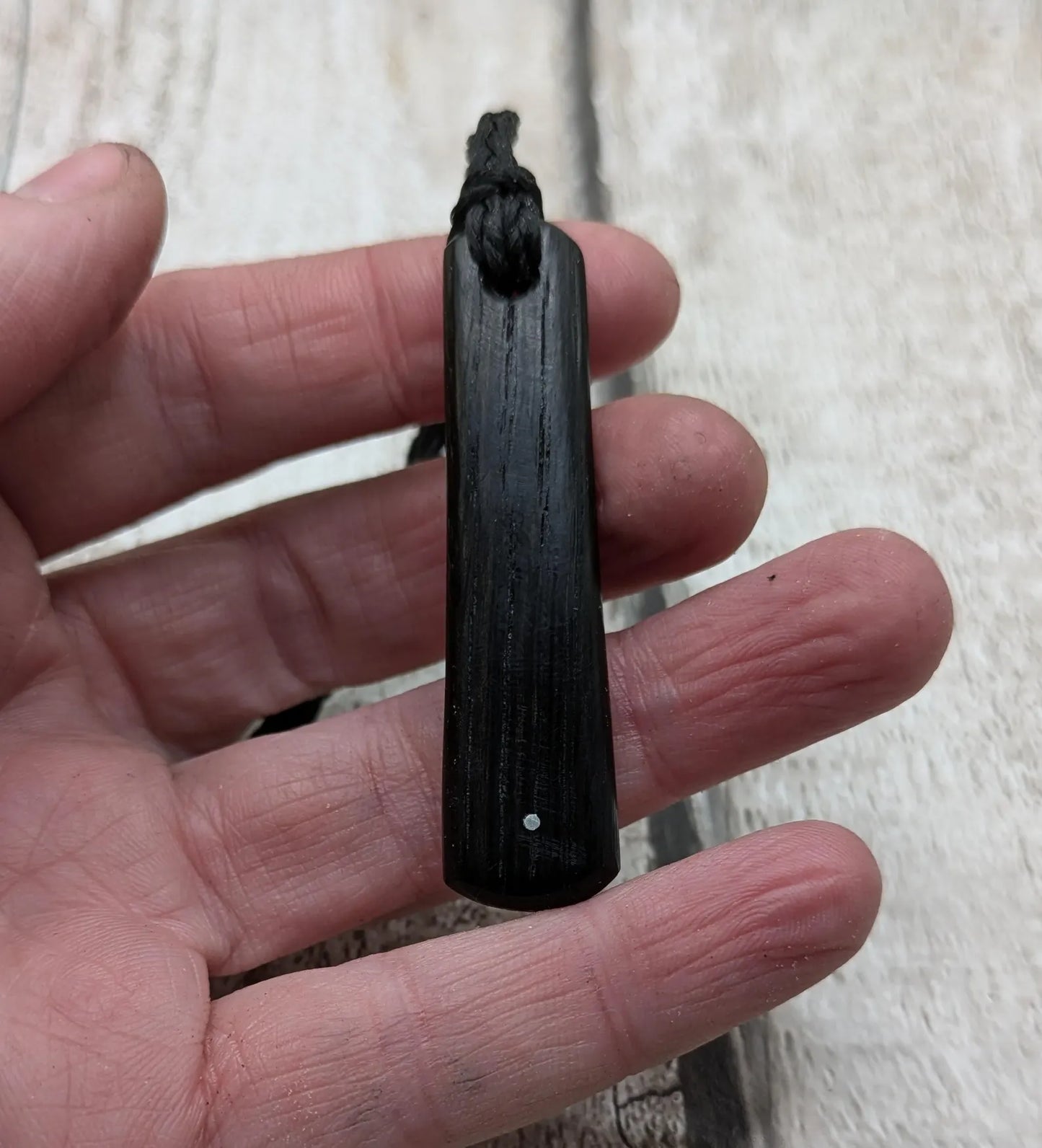Fenland bog oak roimata drop pendant with 925 sterling silver dot.