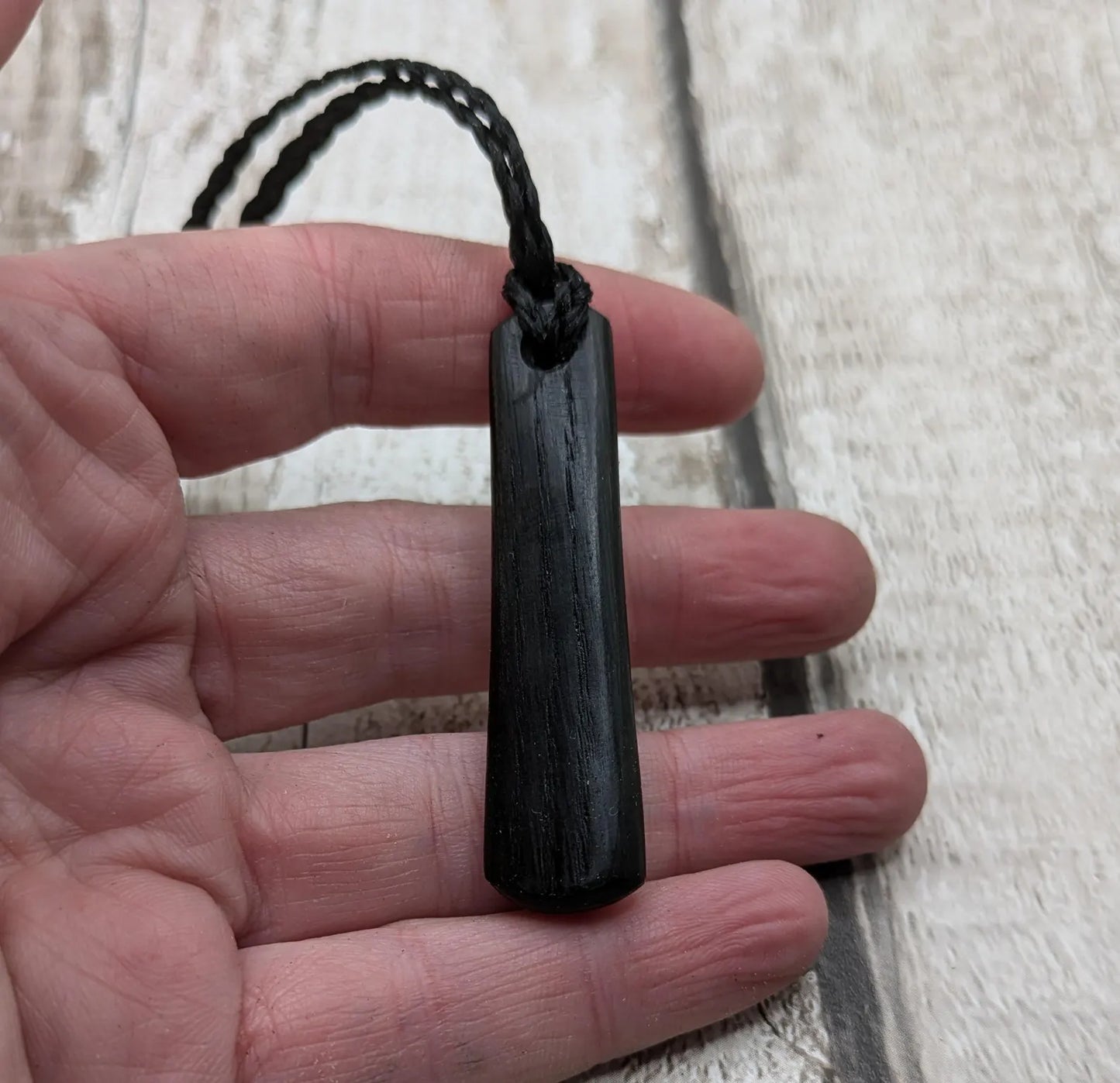 Fenland bog oak roimata drop pendant with 925 sterling silver dot.