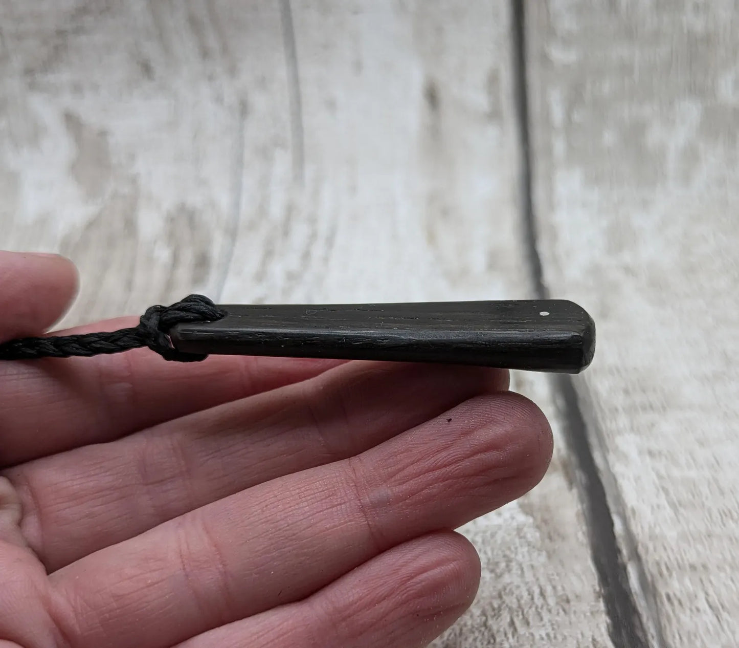 Fenland bog oak roimata drop pendant with 925 sterling silver dot.