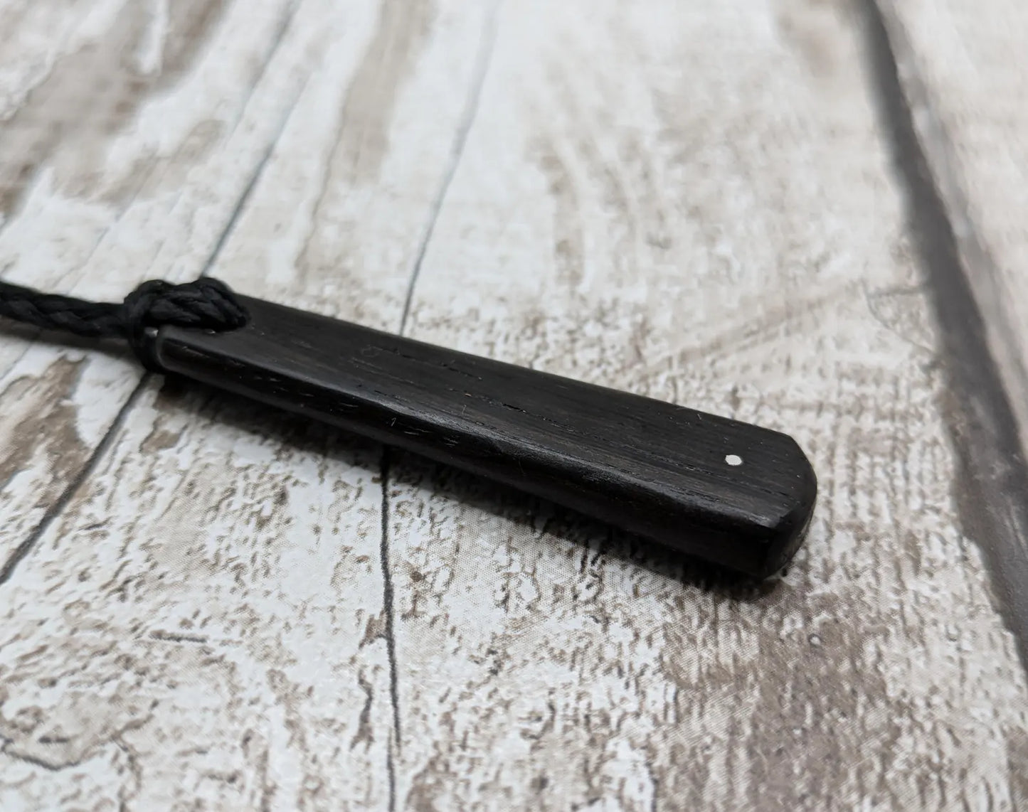Fenland bog oak roimata drop pendant with 925 sterling silver dot.
