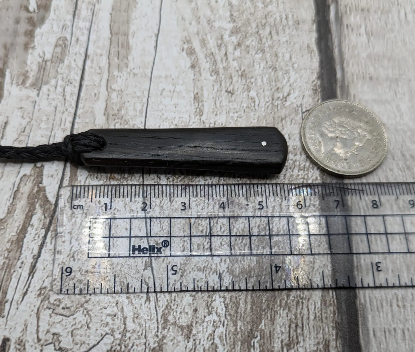 Fenland bog oak roimata drop pendant with 925 sterling silver dot.