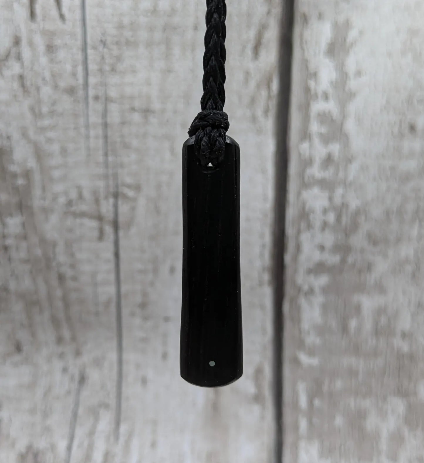 Fenland bog oak roimata drop pendant with 925 sterling silver dot.
