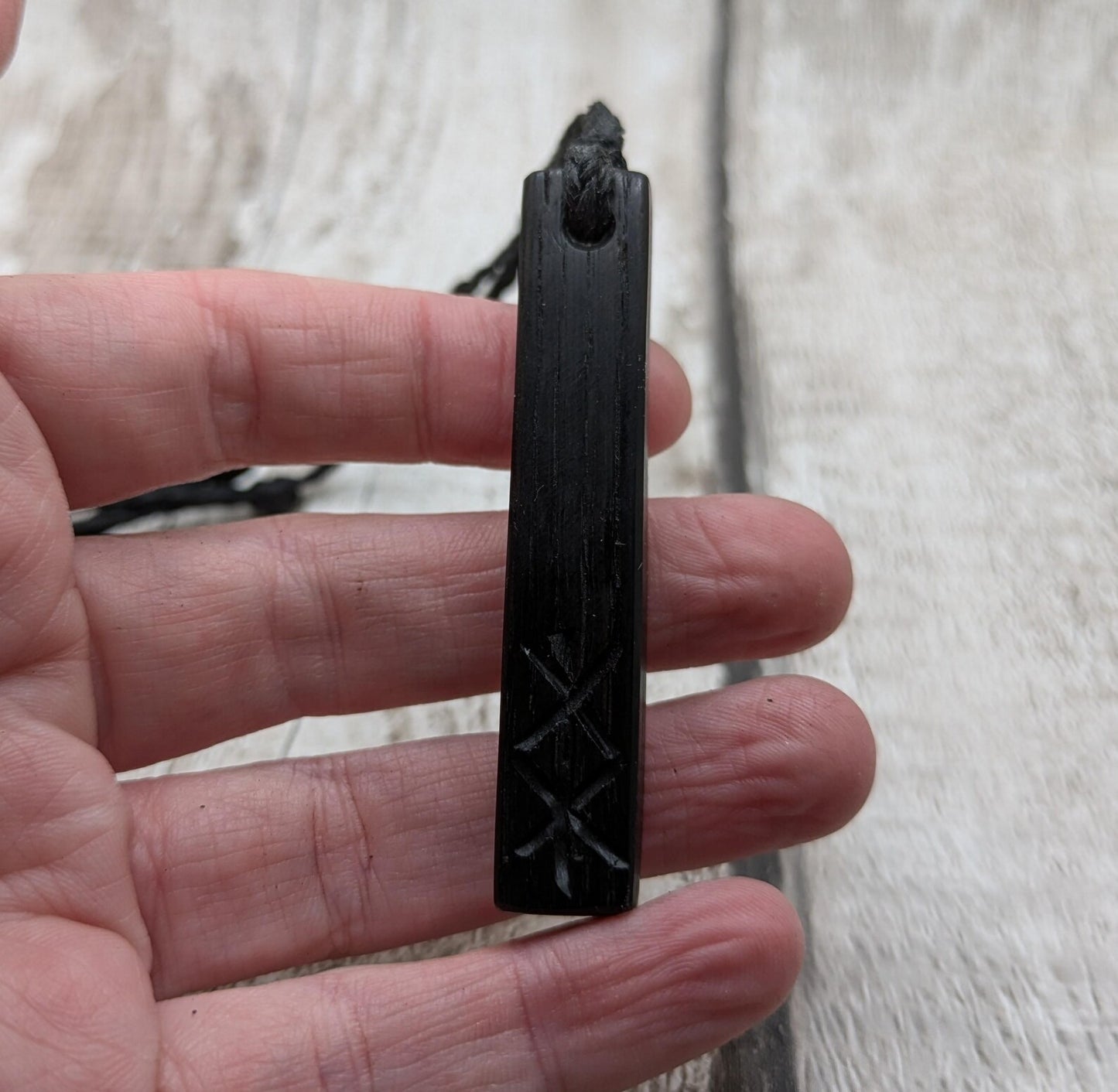 Fenland bog oak pendant with protection bind rune.