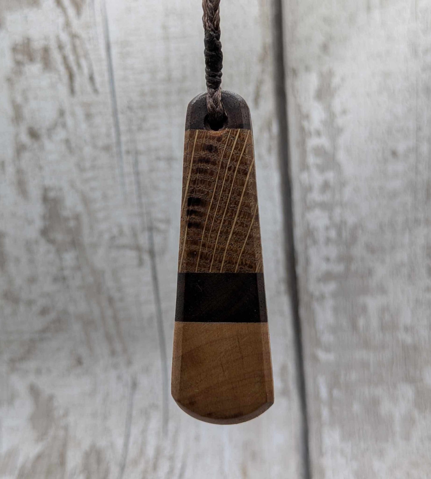Triple wood roimata teardrop pendant.