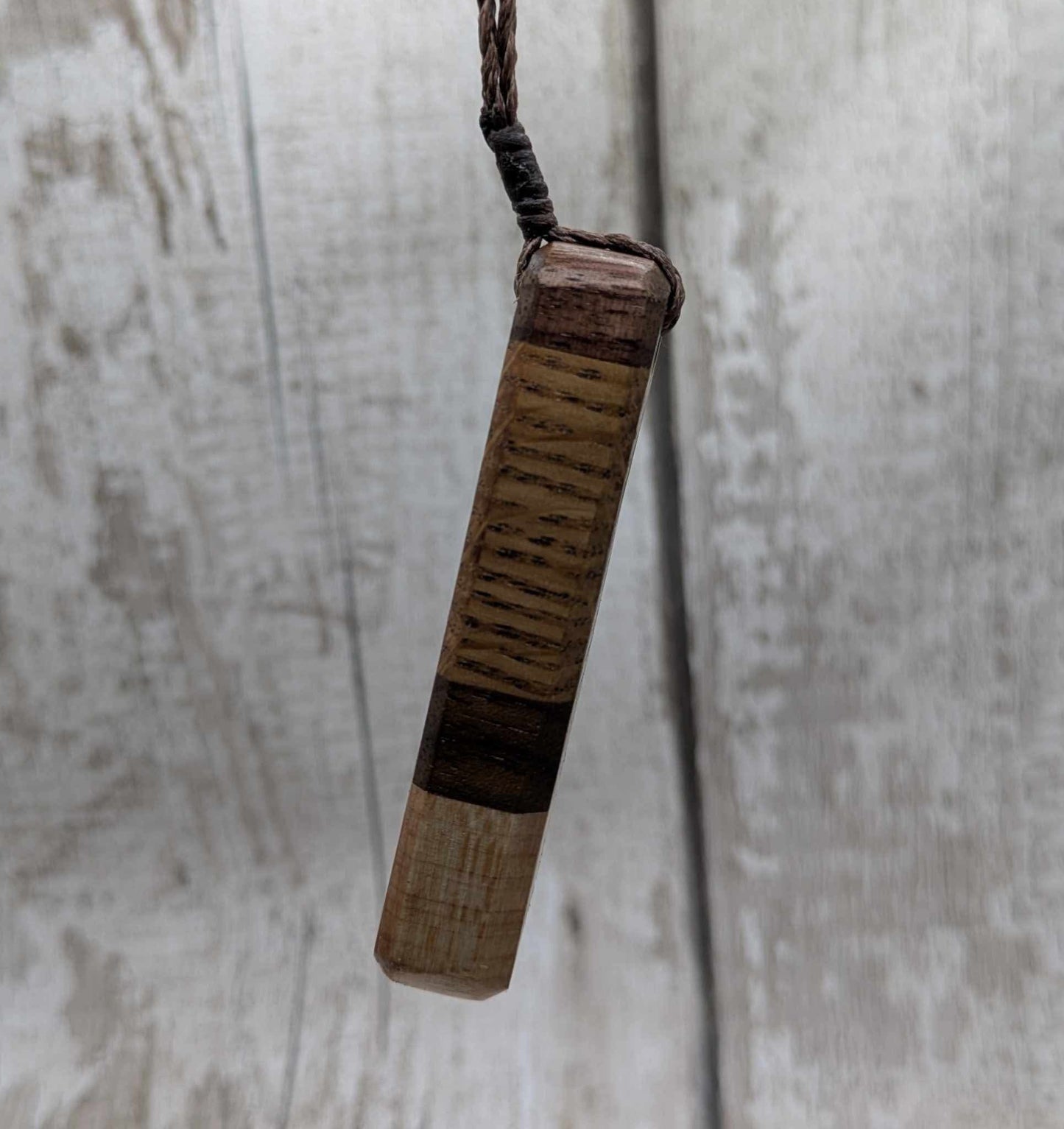 Triple wood roimata teardrop pendant.