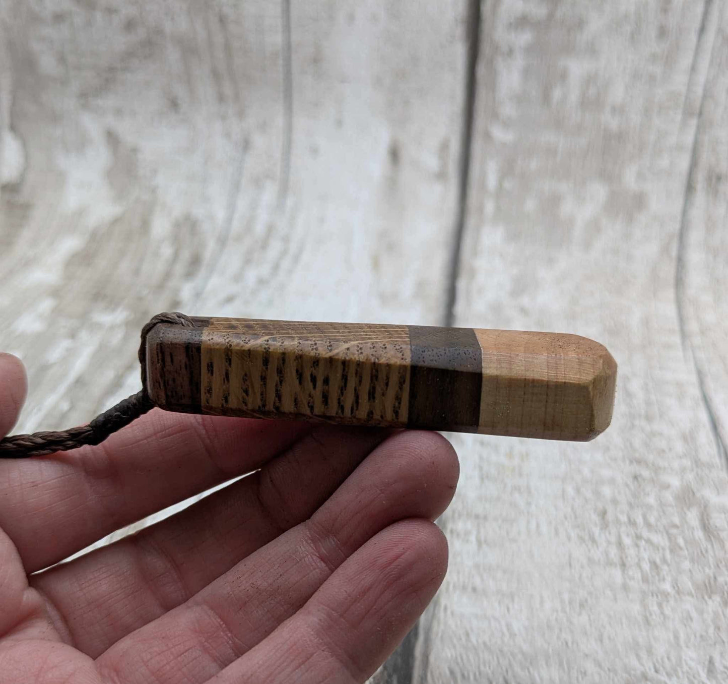 Triple wood roimata teardrop pendant.