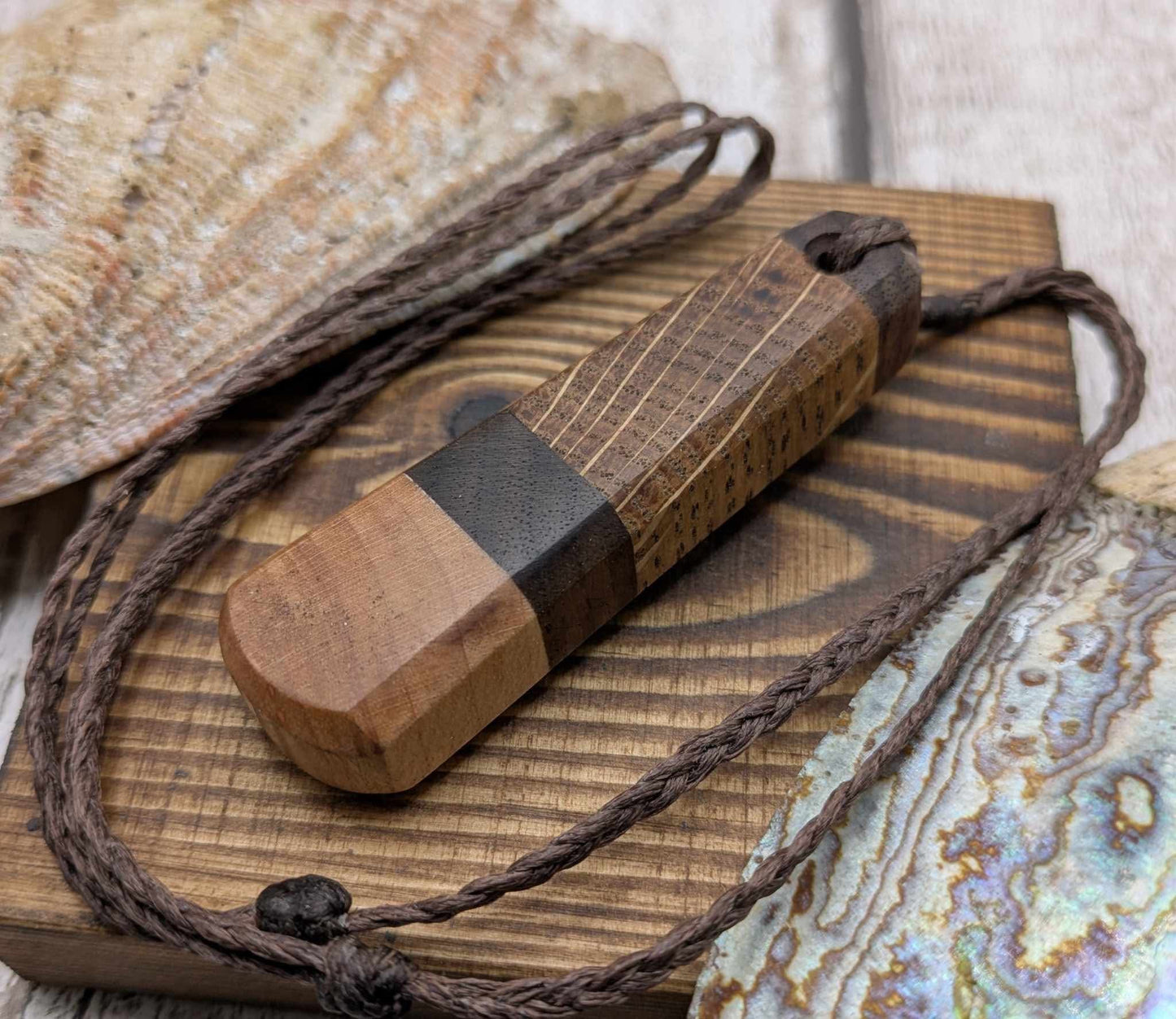 Triple wood roimata teardrop pendant.